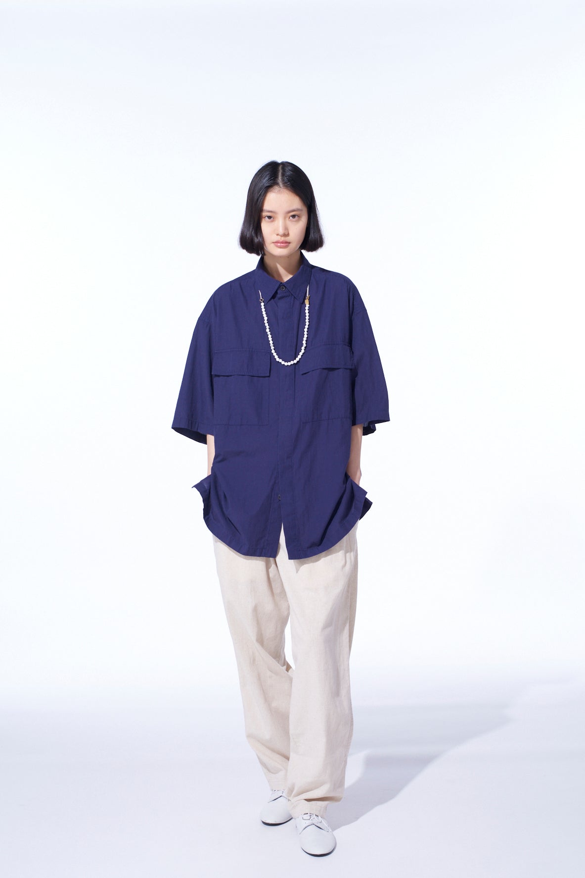 Stylish Oversized Short Sleeve Chambray Shirt with Flap Pockets - Casual Summer Wear for Women & Men | Perfect for Beach Outings, Picnics, and Weekend Getaways