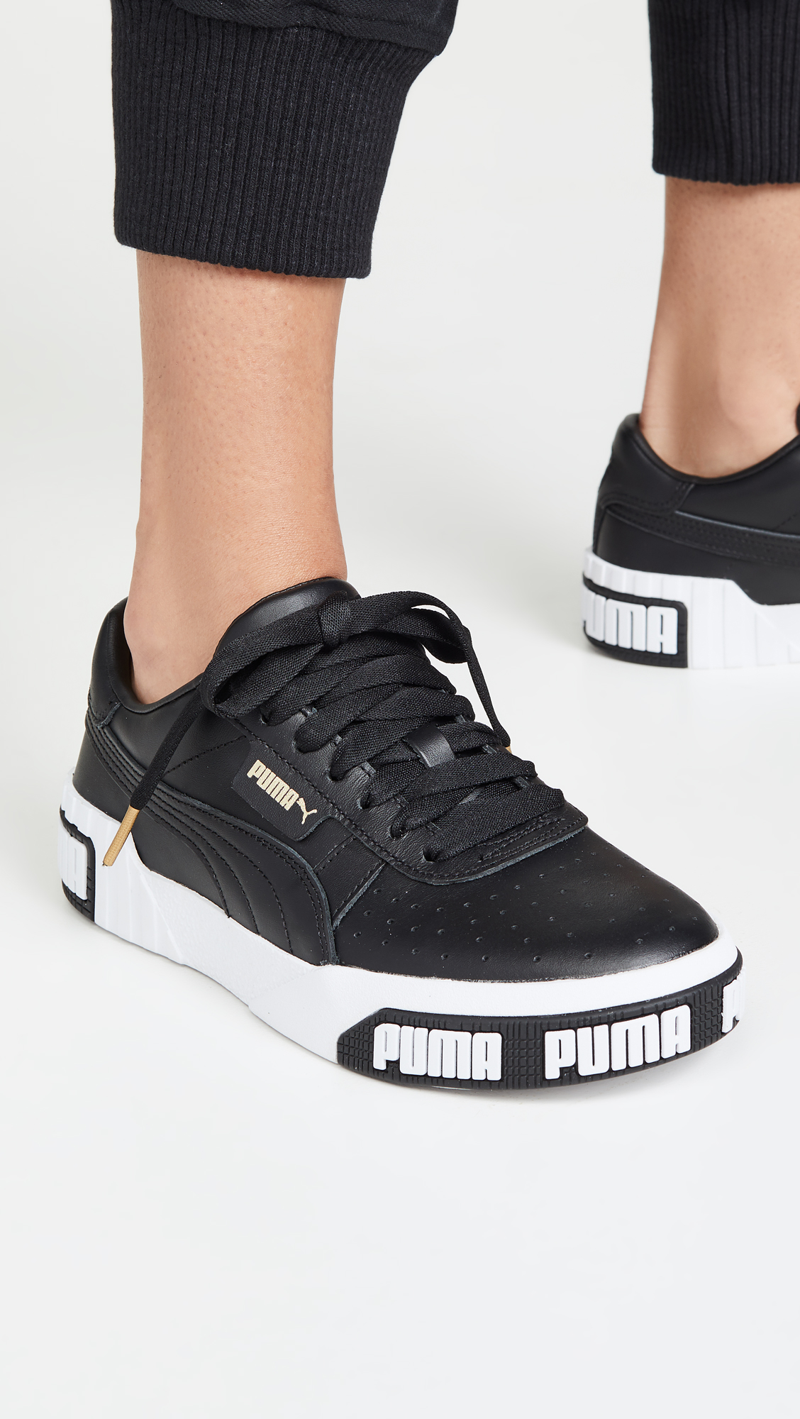 PUMA Women's Cali Bold Sneakers - Black & Metallic Gold - Size 6.5 US - Comfortable Athletic Shoes for Running, Gym & Casual Wear