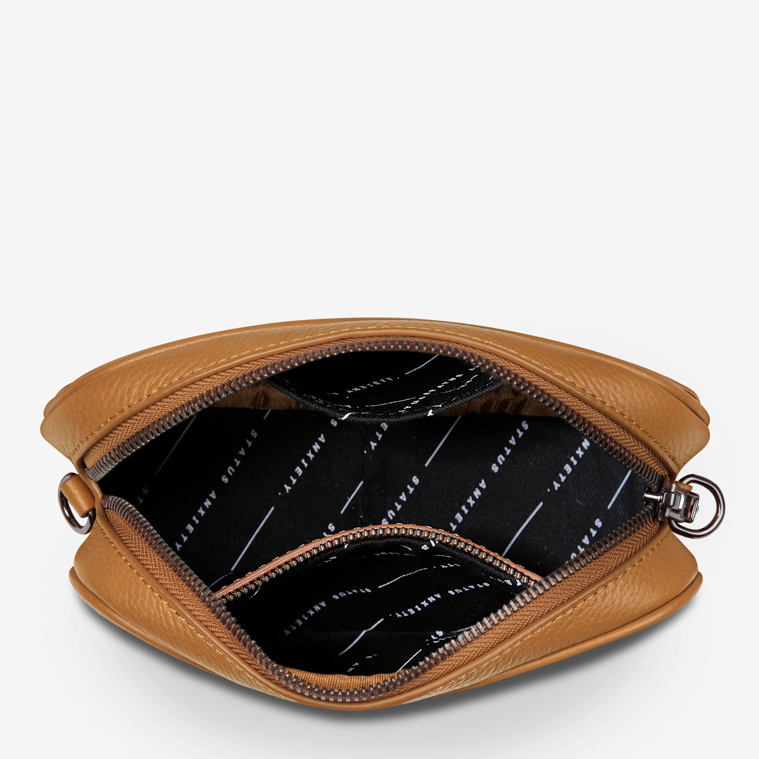 Status Anxiety Plunder Crossbody Bag with Webbed Strap in Tan - Perfect for Everyday Use, Travel & Casual Outings