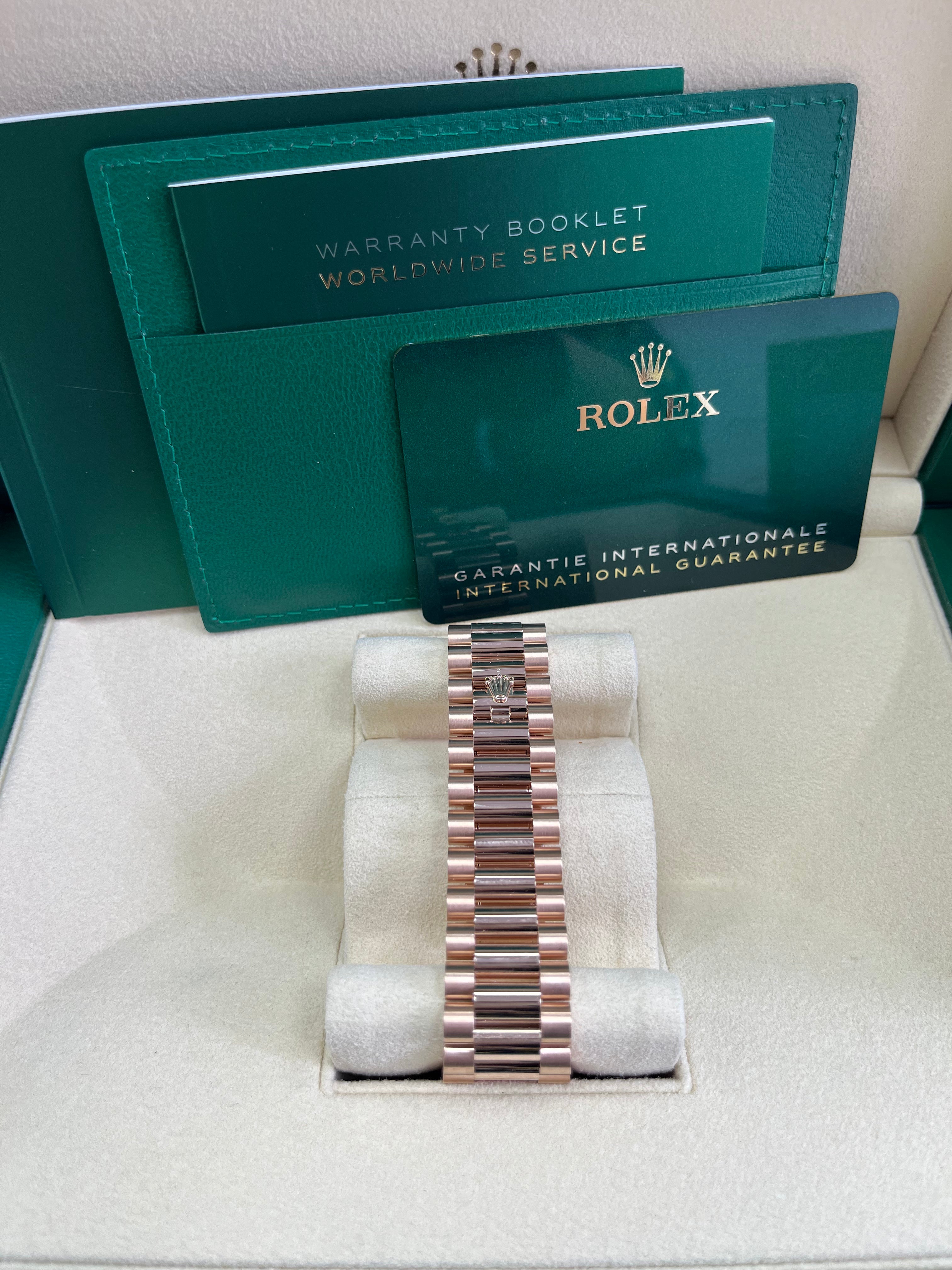 Rolex Day Date 40 Watch - 18K Yellow Gold, Fluted Bezel, Sundust Baguette Diamond Dial, President Bracelet 228235 | Luxury Dress Watch for Business & Formal Occasions