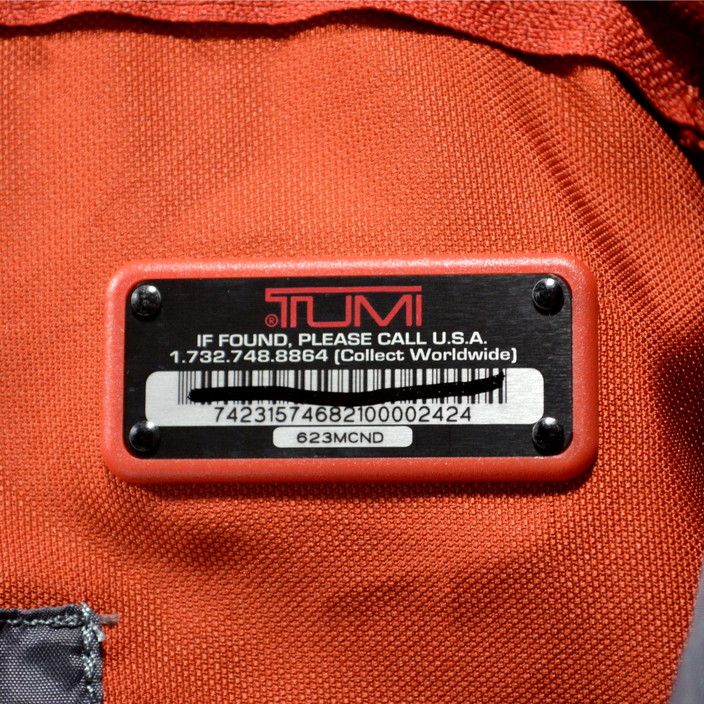 Pre-Owned TUMI Travel Jacket - Medium Size in Burnt Orange & Gray with Large Pockets | Perfect for Business Trips & Outdoor Adventures