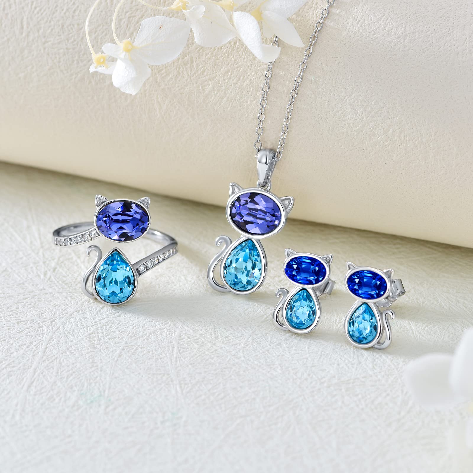 OBOCO Sterling Silver Cat Jewelry Set - Blue Purple Austrian Crystal Adjustable Ring & Stud Earrings | Adorable Kitten Pet Jewelry for Cat Lovers | Perfect Anniversary Gift for Women | Great for Casual Wear, Date Nights & Cat-Themed Parties