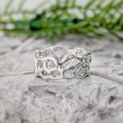 The Tale of the Molten Silver Honeycomb Ring: A Symbol of Strength and Beauty