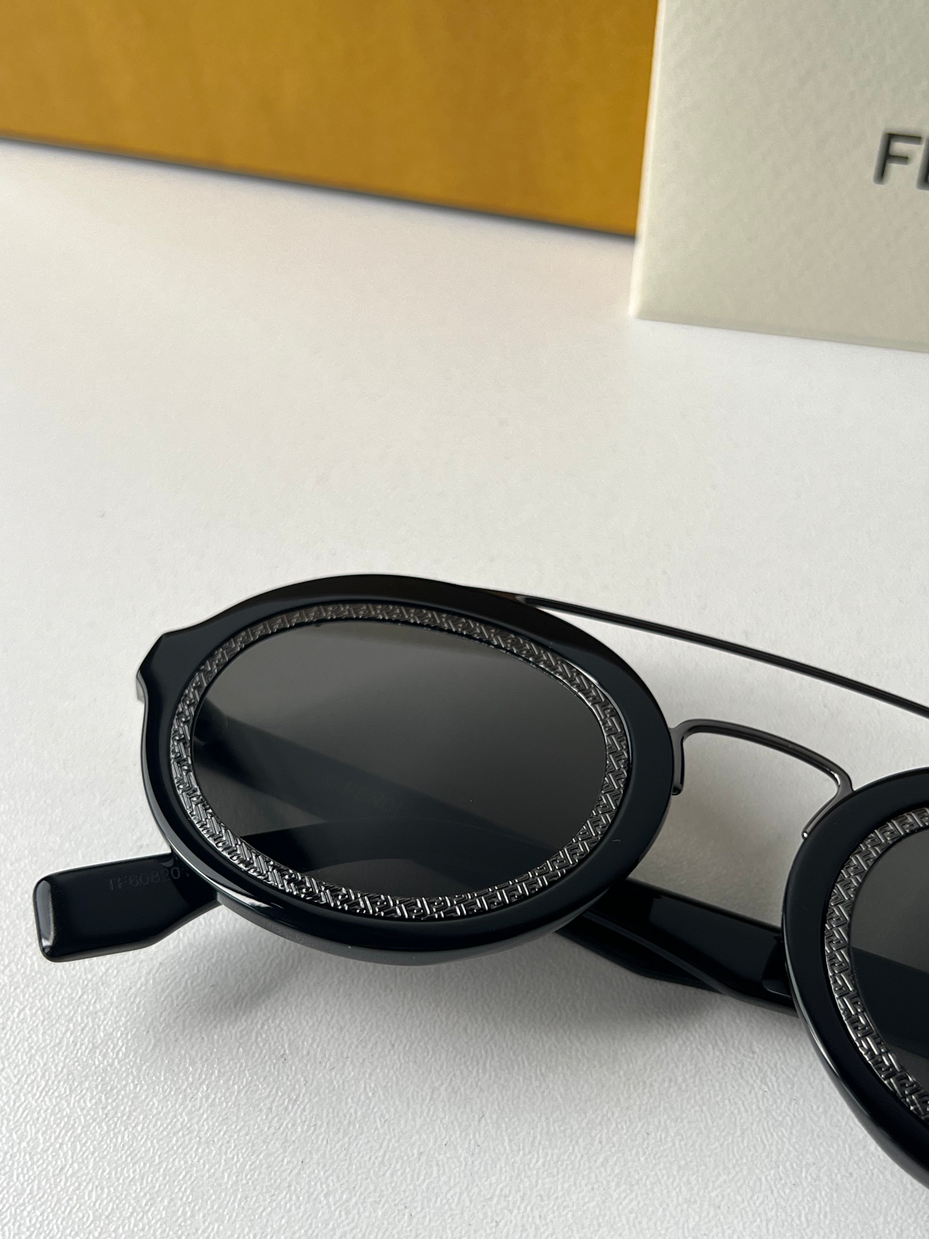 Fendi FF Around FE40094I Black Round Sunglasses for Women - Stylish UV Protection Shades for Outdoor, Beach & Driving
