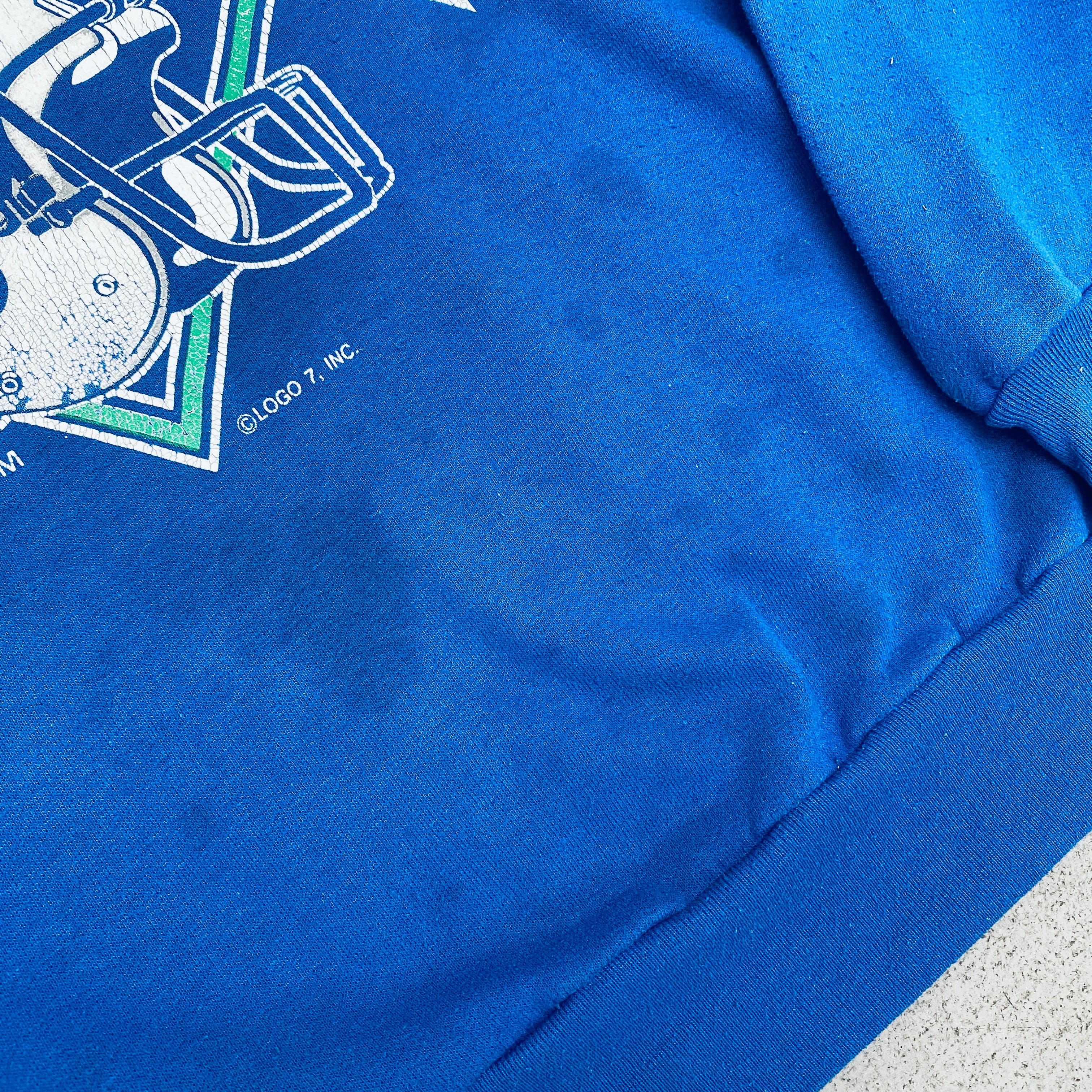 Seattle Seahawks Vintage 1990s Logo 7 Graphic Spellout Sweatshirt (Small) - Perfect for Game Day, Sports Fans & Retro Fashion Enthusiasts