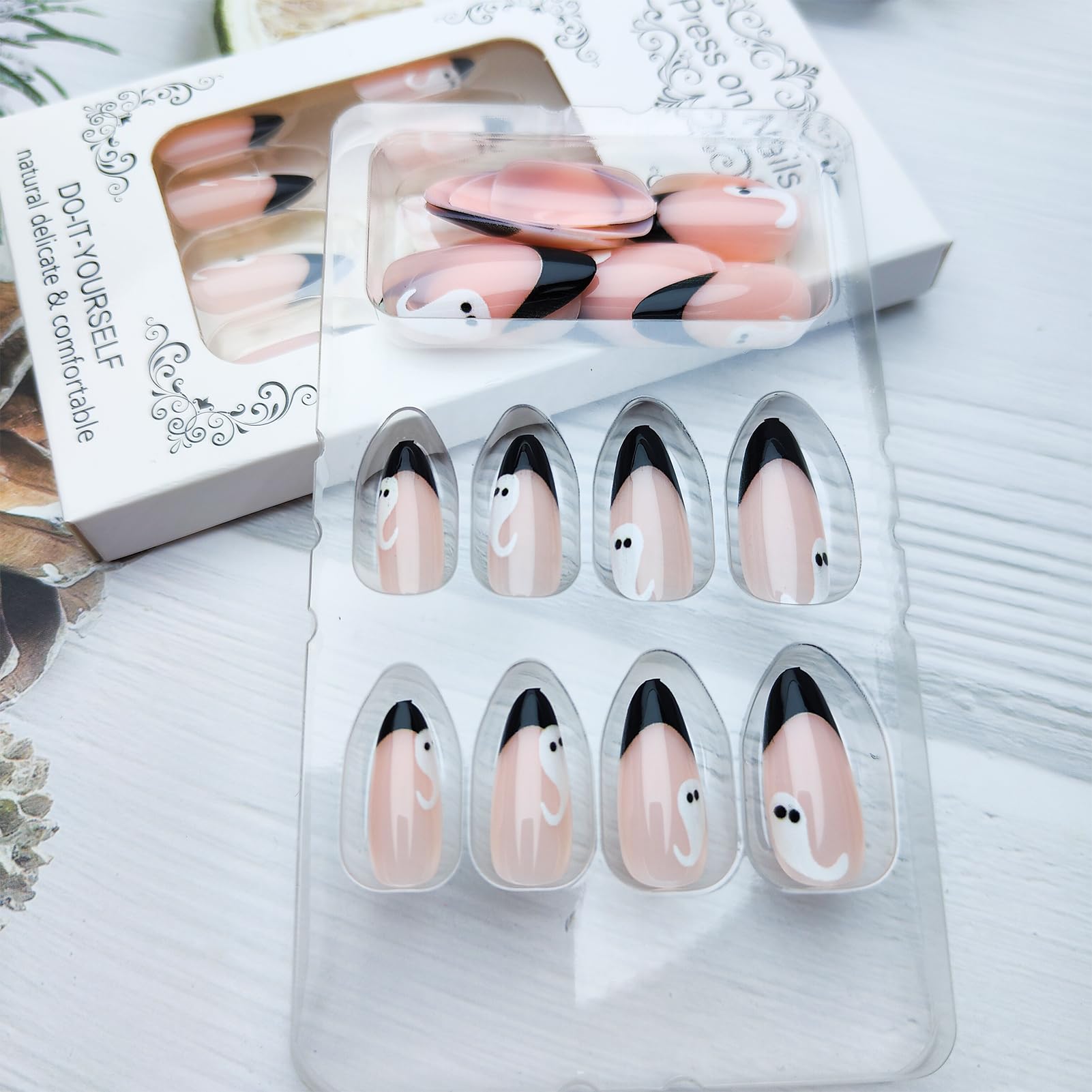 Black French Tip Press on Nails - Medium Almond Fake Nails with White Ghost Designs | Glossy Nude Pink False Nails for Women & Girls | Halloween Manicure Set of 24Pcs | Perfect for Halloween Parties, Costume Events & Spooky Nail Art