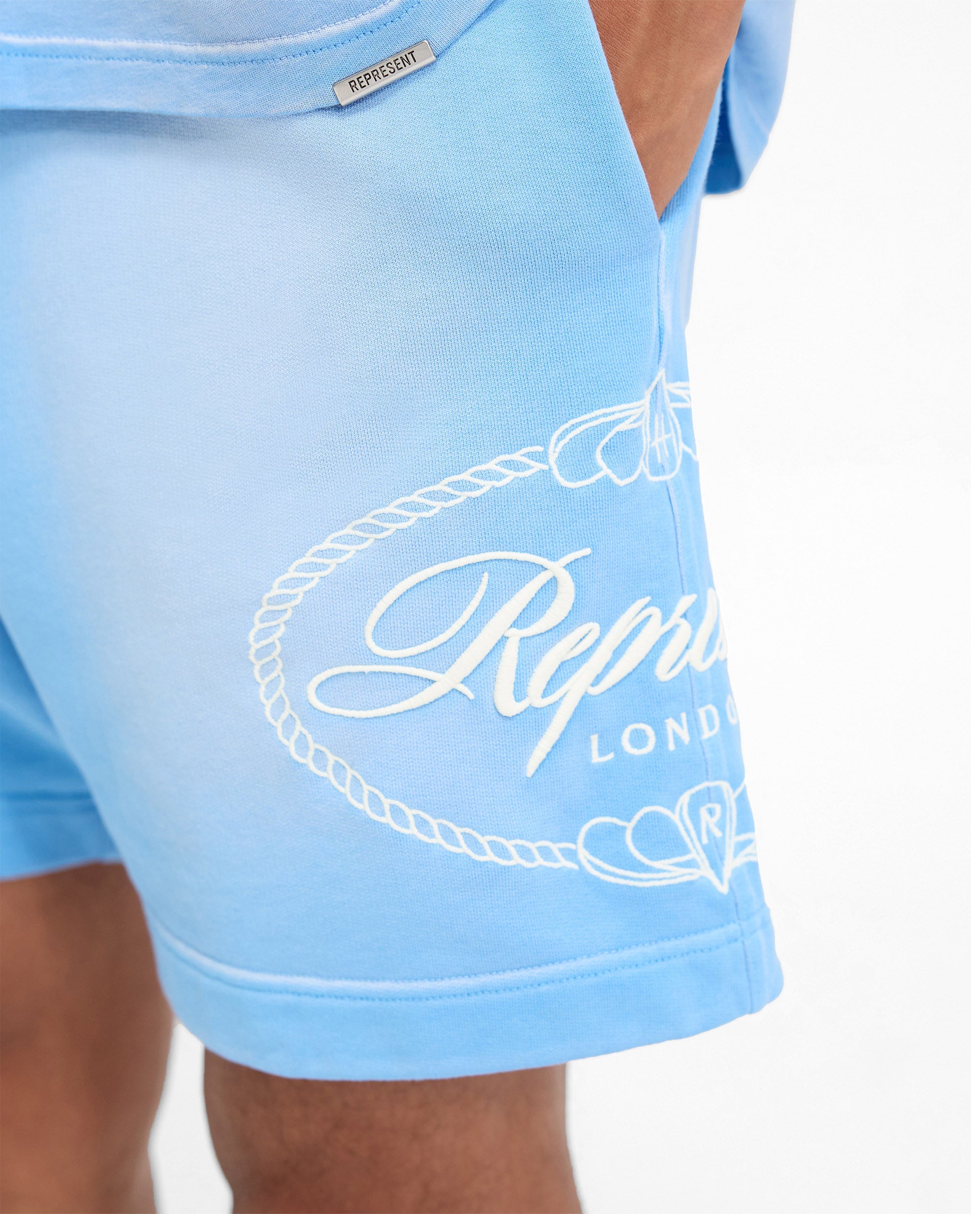 Represent X Harrods Crest Short - Cloud Blue | Premium Streetwear Shorts for Men | Perfect for Summer, Casual Outings & Gym Wear