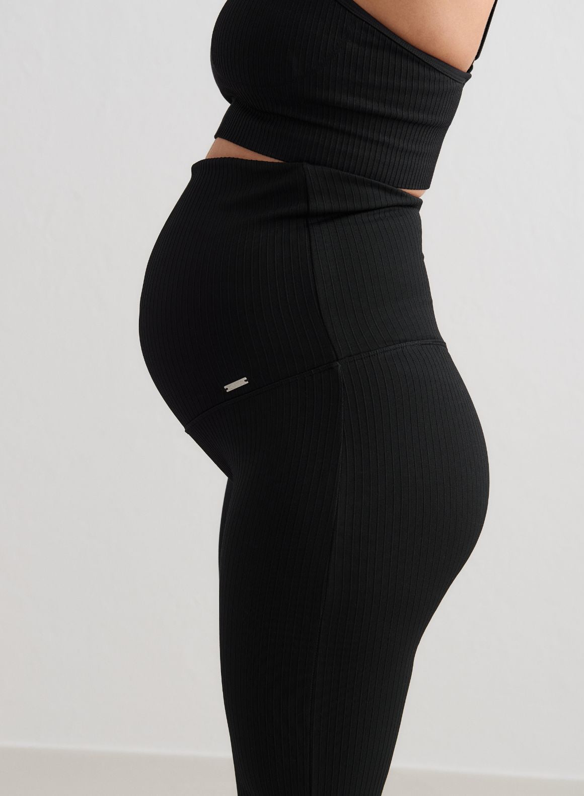Black Ribbed Seamless Flare Maternity Tights - Stretchy Pregnancy Leggings for Comfort & Style - Perfect for Yoga, Workouts & Everyday Wear During Pregnancy
