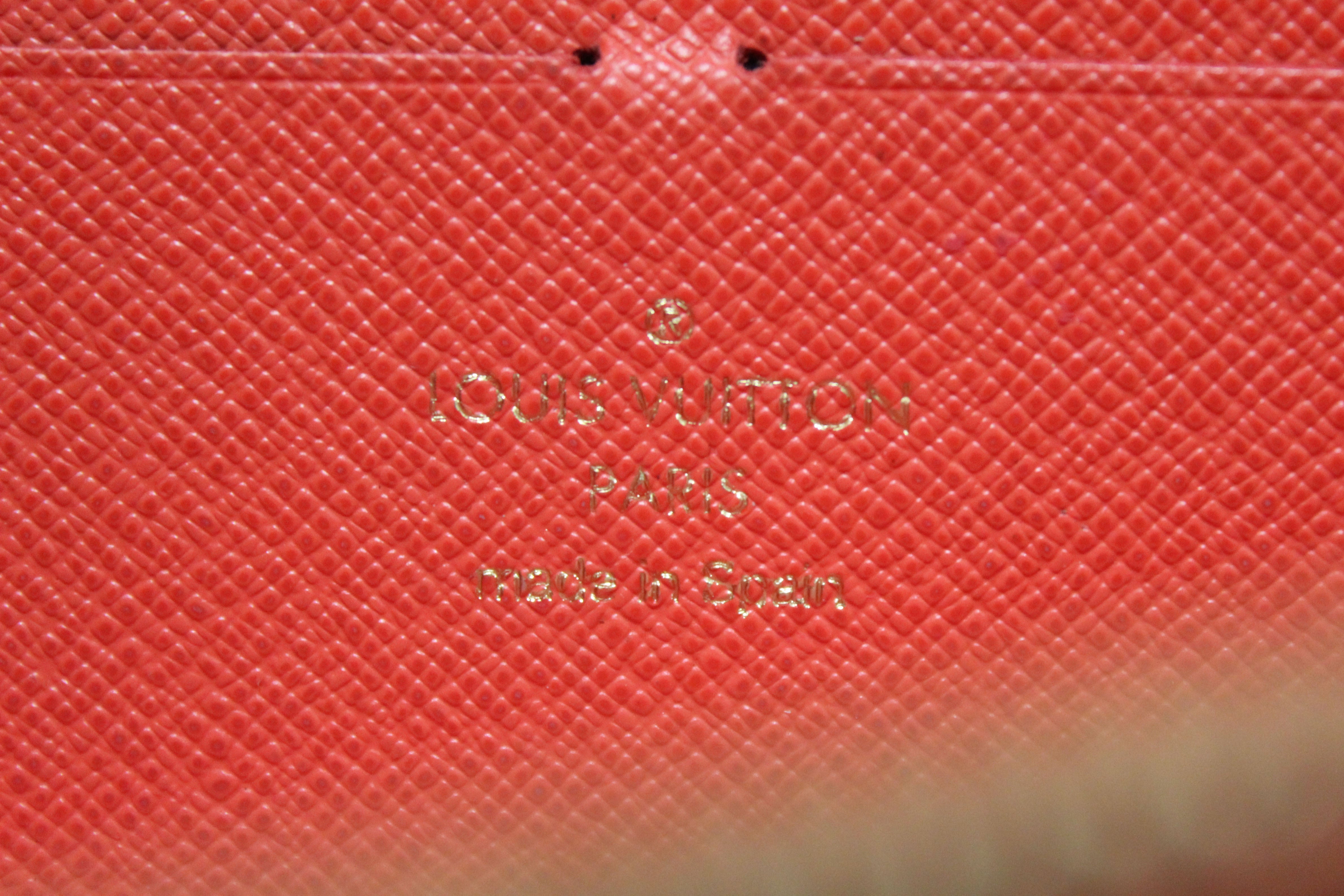 Authentic Louis Vuitton Damier Ebene 2015 Christmas Animation Zippy Wallet Poppy Red - Luxury Designer Wallet for Women, Perfect for Holiday Gifts & Everyday Use