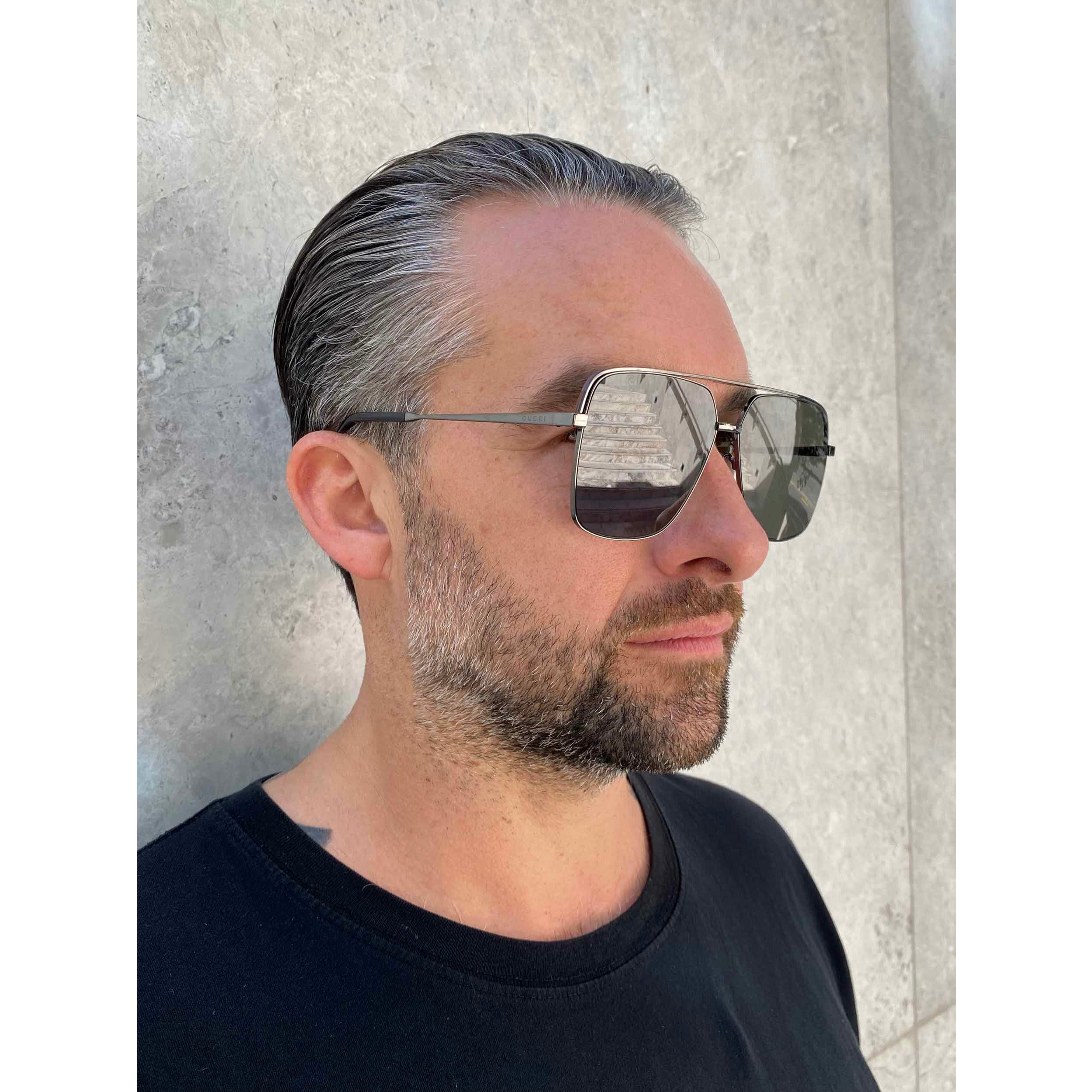 Gucci GG 1099A 001 Gunmetal Grey Sunglasses - Luxury Designer Shades for Men & Women - Perfect for Outdoor Activities, Beach & Fashion Statement