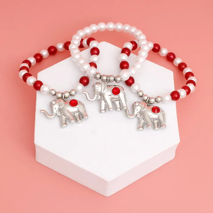 Elegant Red & White Stone Elephant Stretch Pearl Bracelet – Boho Chic Jewelry for Women, Perfect for Parties, Weddings & Everyday Wear