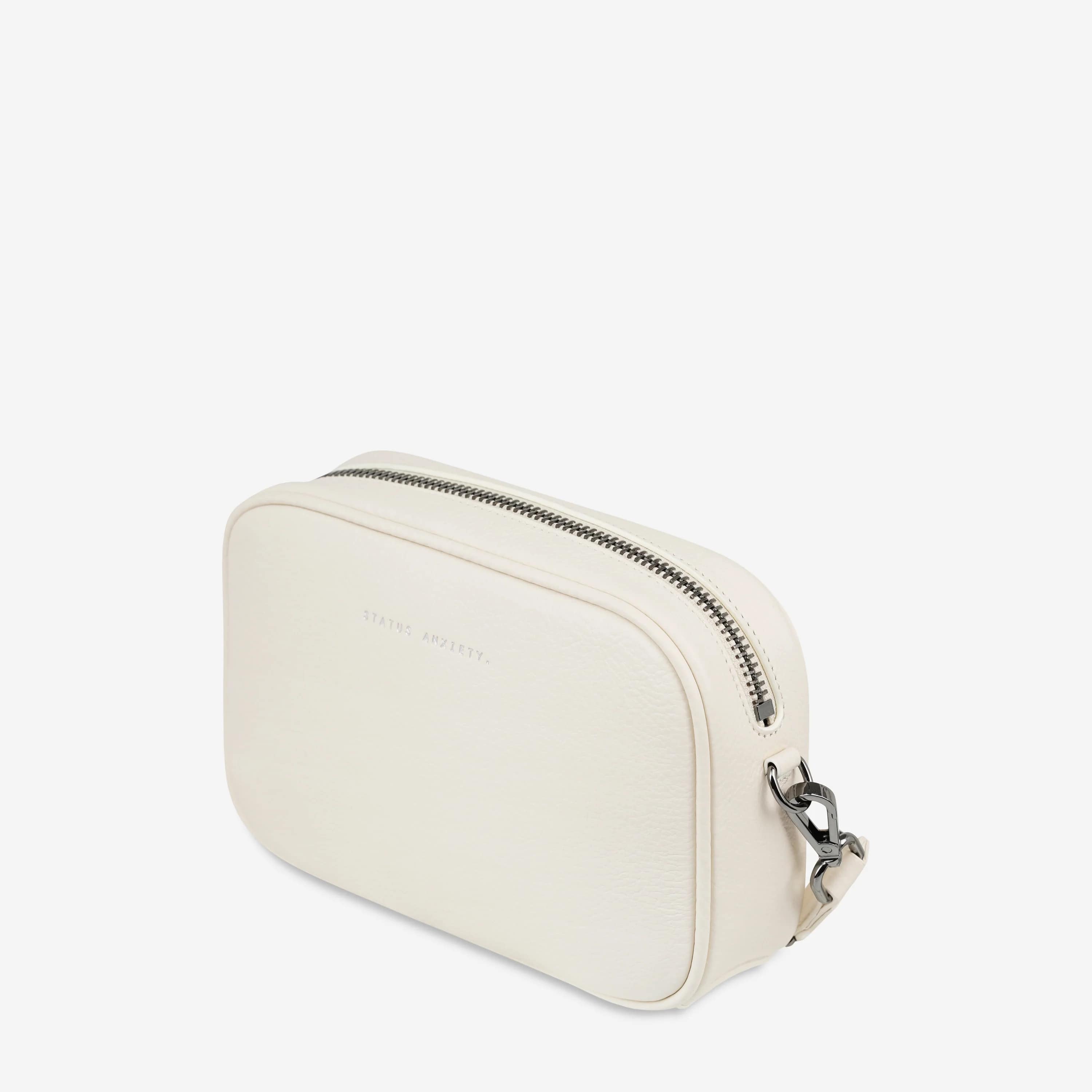Status Anxiety Plunder Crossbody Bag with Webbed Strap in Chalk - Perfect for Everyday Use, Work, and Travel