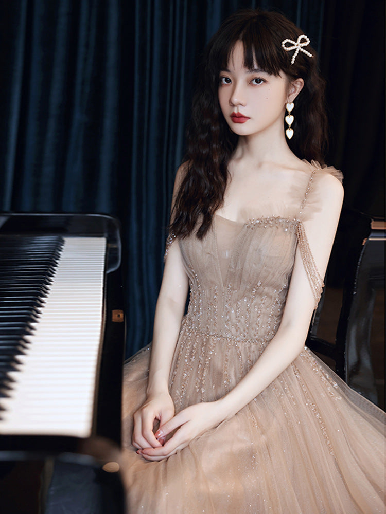 Elegant Champagne A-Line Tulle Prom Dress with Spaghetti Straps - Formal Evening Gown for Homecoming, Wedding, and Special Occasions - Style 307