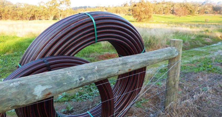 200m Heavy Duty Redline Poly Pipe for Rural Irrigation - Durable & Flexible Water Hose for Farming, Gardening, and Agricultural Use