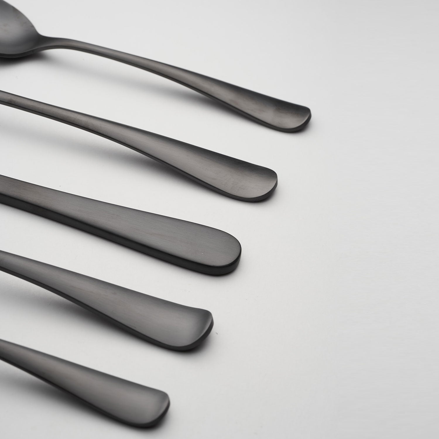 Rhiannon Black Satin 20-Piece Flatware Set - Stainless Steel Cutlery Set for 4, Modern Dinnerware for Everyday Use & Special Occasions