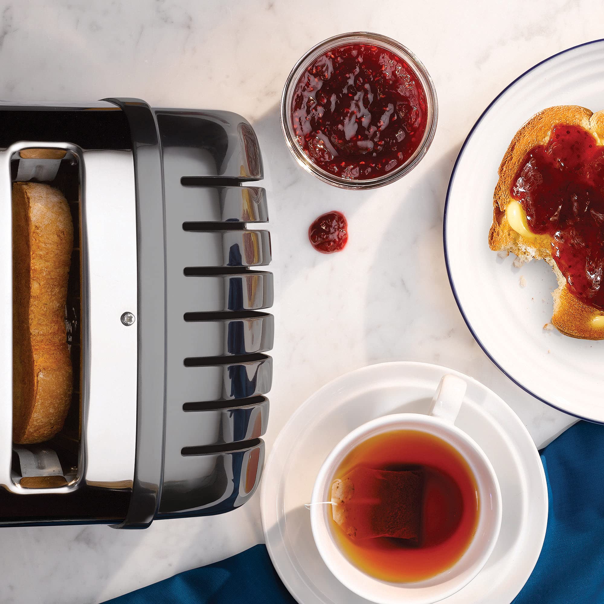 Dualit Classic 4-Slice Stainless Steel Toaster - Handcrafted in UK - ProHeat Replaceable Elements - Defrost & Reheat Function - Mechanical Timer - Perfect for Breakfast, Brunch & Kitchen Countertop Use