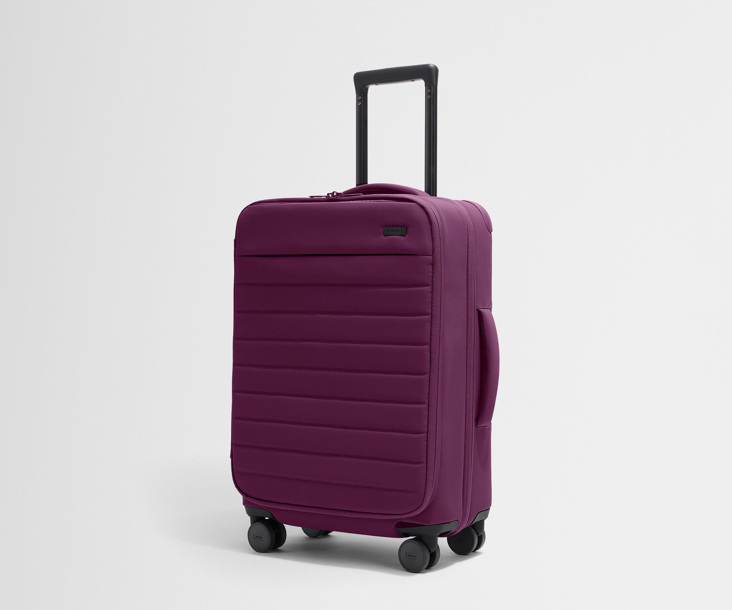 Softside Bigger Carry On Luggage in Plum Purple - Lightweight Expandable Suitcase for Air Travel & Weekend Getaways