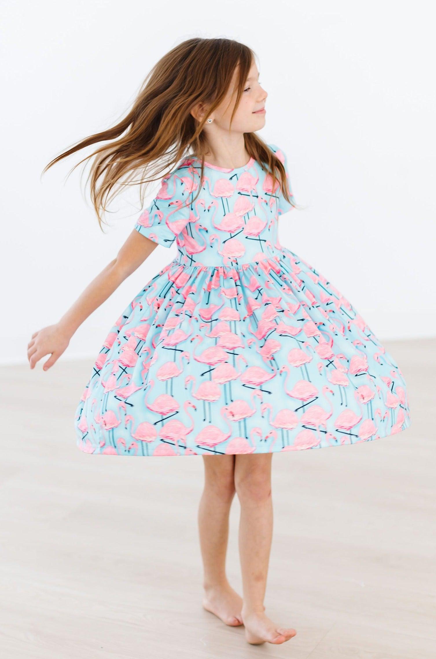 Stylish Pink Flamingo Short Sleeve Pocket Twirl Dress for Women - Perfect for Summer Parties, Beach Vacations & Casual Outings