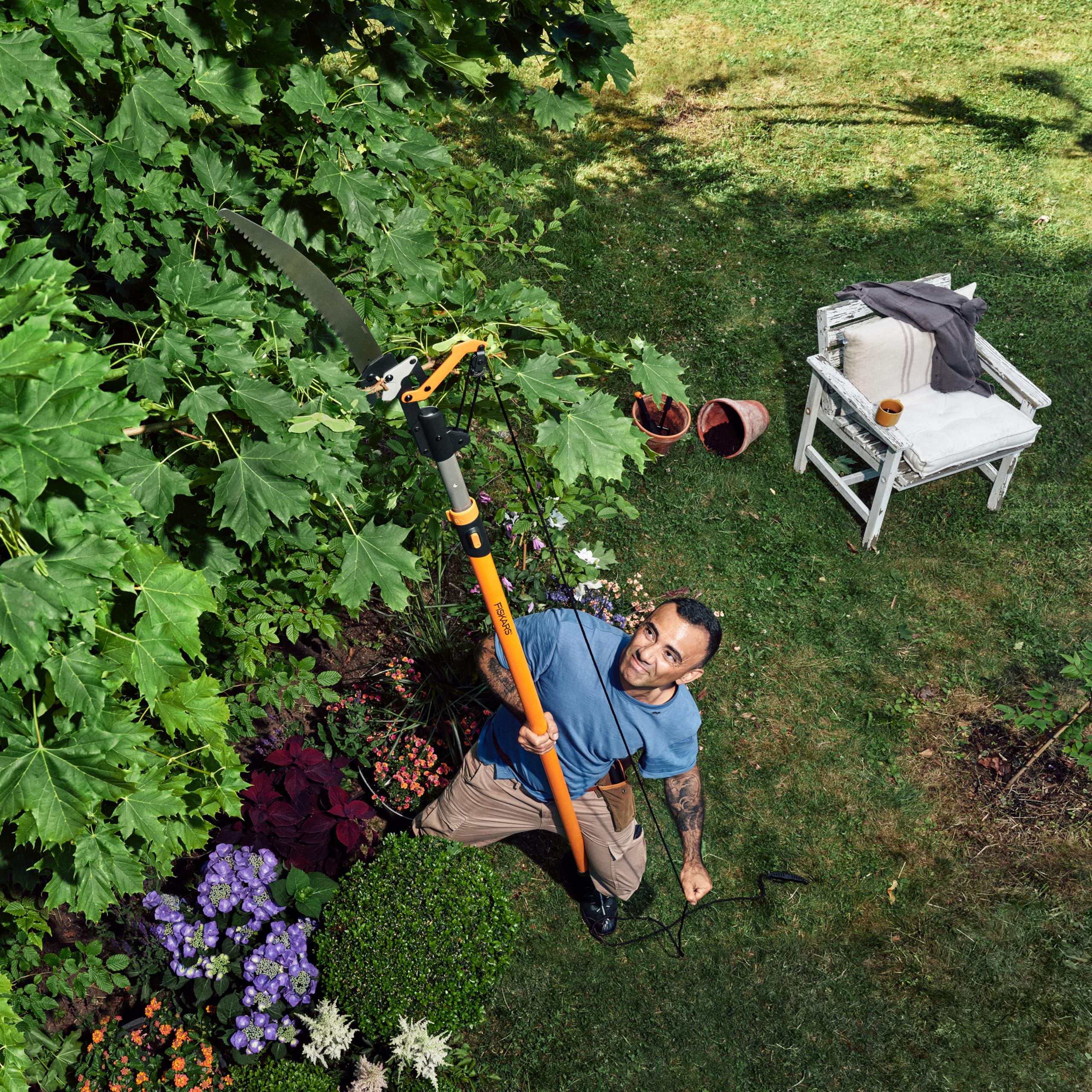 Fiskars 7ft-14ft Extendable Pole Saw & Tree Pruner - Power-Lever Technology for Easy Cutting - Heavy Duty Garden Tool for Tree Trimming & Pruning (Black/Orange) - Perfect for Lawn Care, Landscaping & Outdoor Maintenance