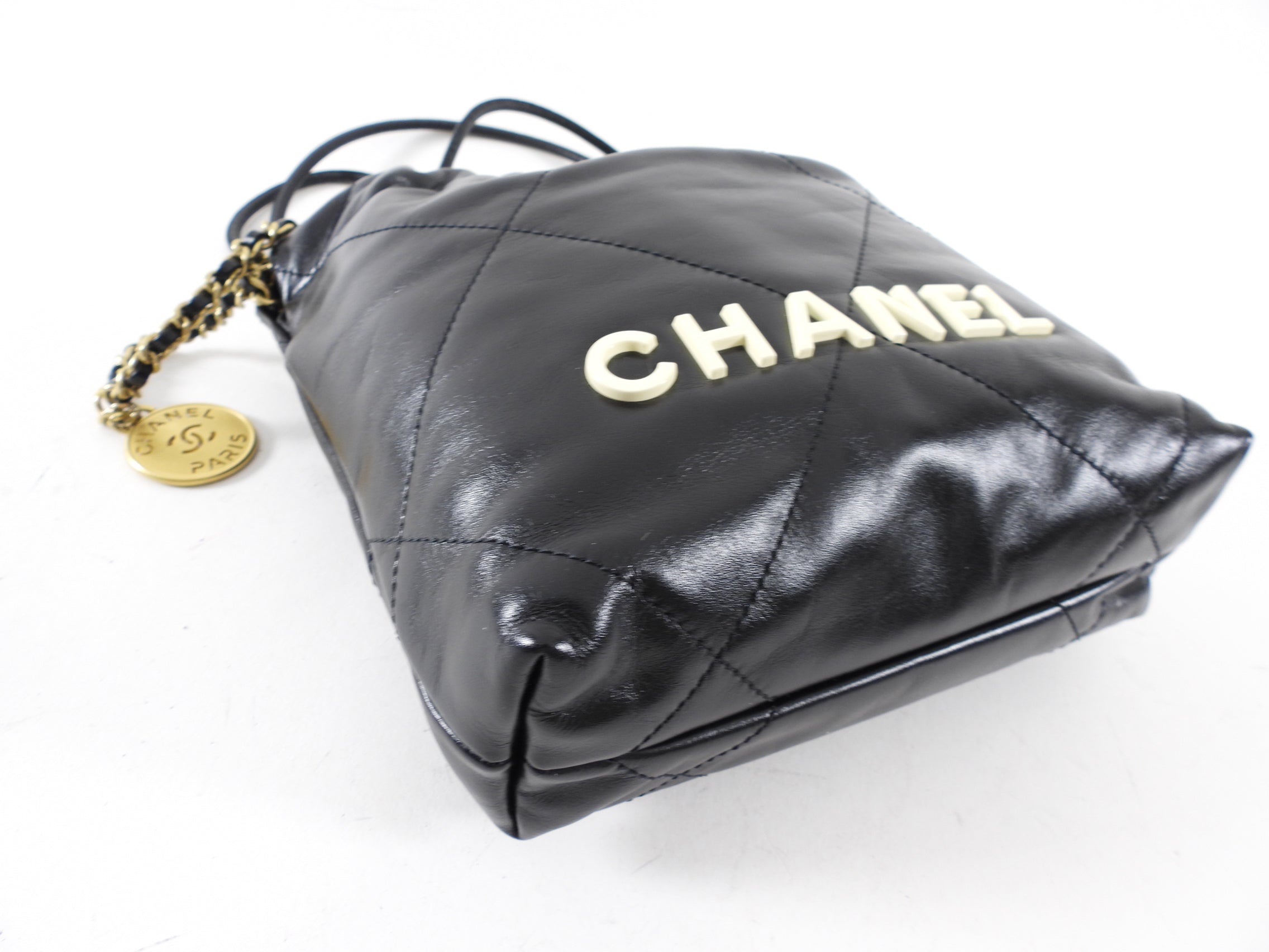 Chanel 2023 Black Leather Chain 22 Mini Bag with Ivory Enamel Logo - Luxury Designer Handbag for Women, Perfect for Evening Parties & Date Nights