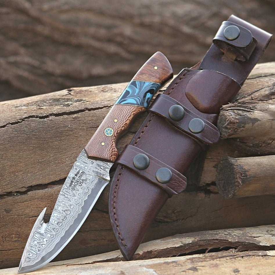 Premium Damascus Steel Python Gut Hook Knife with Exotic Leopard Wood Handle & Turquoise Inlays – Ideal for Hunting, Camping, and Outdoor Survival