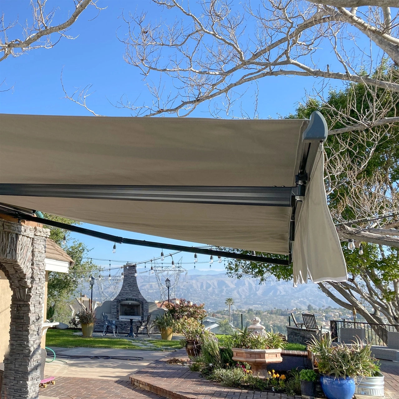 Aleko 13x10 Feet Motorized Retractable Patio Awning - White Frame, Ivory Fabric - Perfect for Outdoor Shade, Backyard, Deck, and Poolside Relaxation