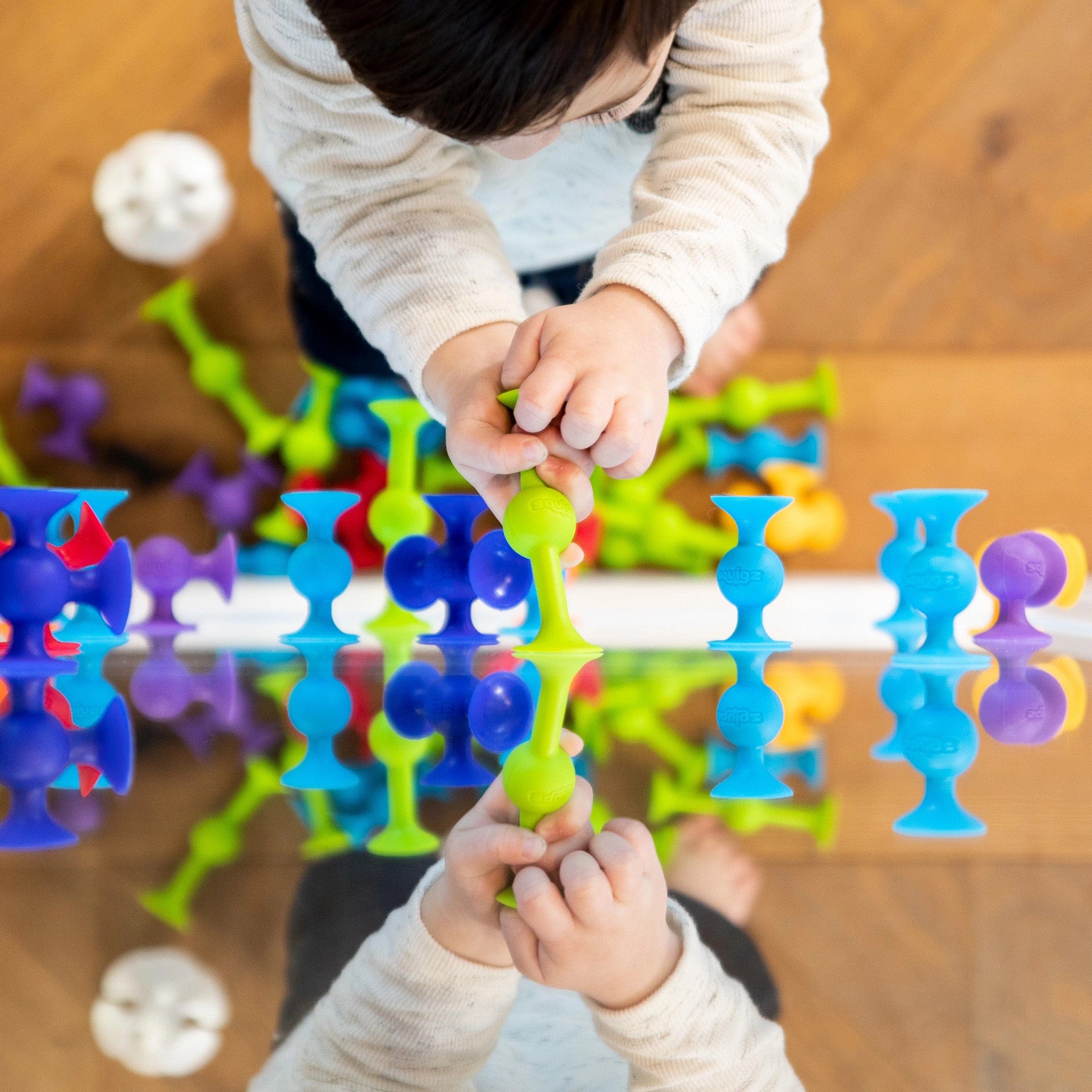 Fat Brain Toys Squigz Deluxe Set - 50-Piece STEM Learning Building Toy for Kids, Creative Construction Play for Boys & Girls - Perfect for Home, Classroom & Travel Activities