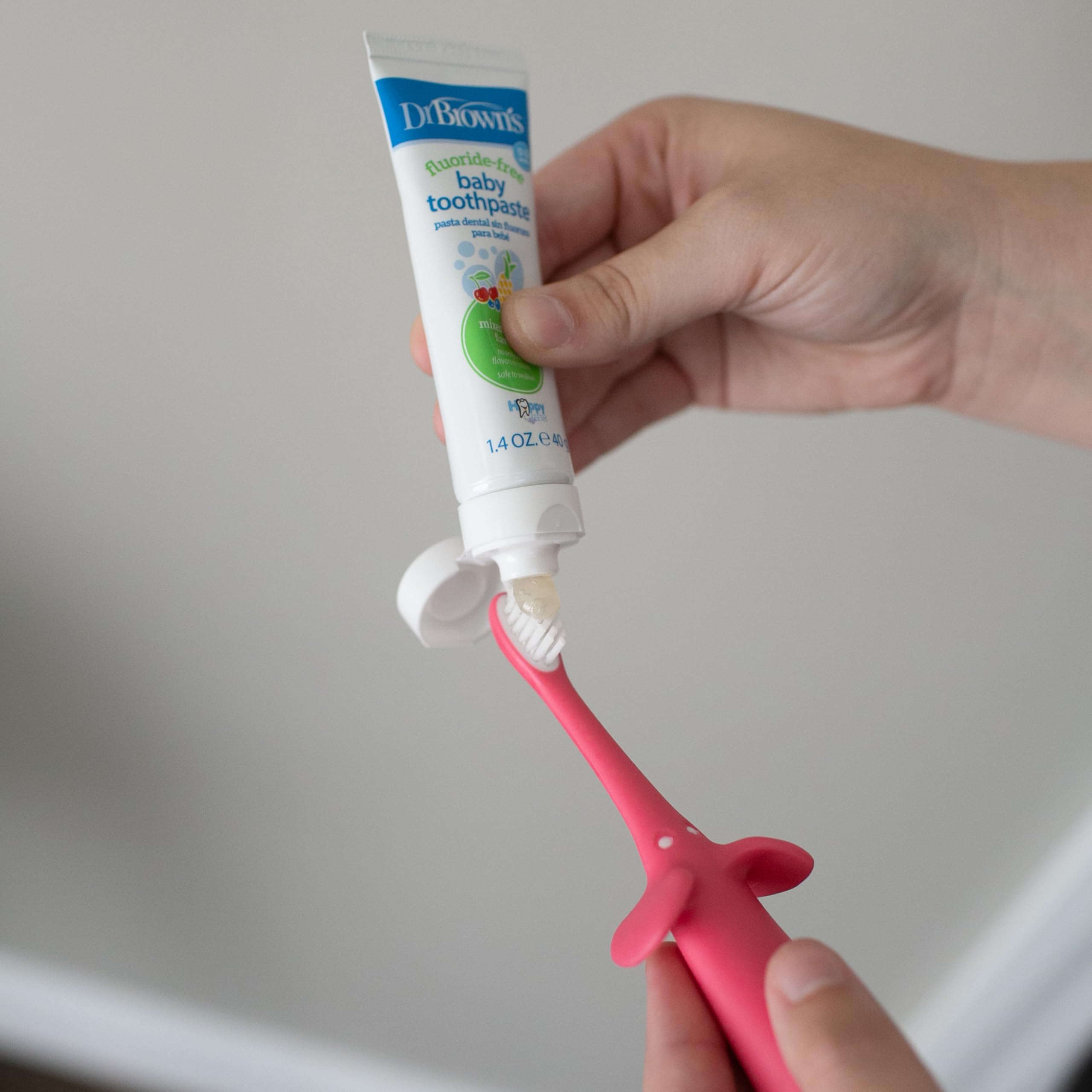 Dr. Brown's Soft Baby Toothbrush for Infants & Toddlers 0-3 Years - Gentle First Teeth Cleaning - Pink Elephant Design (Colors Vary) - Perfect for Baby's Oral Care Routine & Early Dental Hygiene