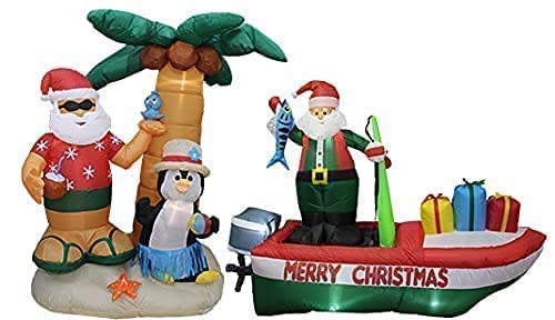 7ft Inflatable Santa Claus & Penguin Island with Palm Tree + 8ft Inflatable Santa Fishing Boat with Lights - Christmas Party Decorations Bundle for Outdoor Yard, Lawn, and Holiday Festive Decor