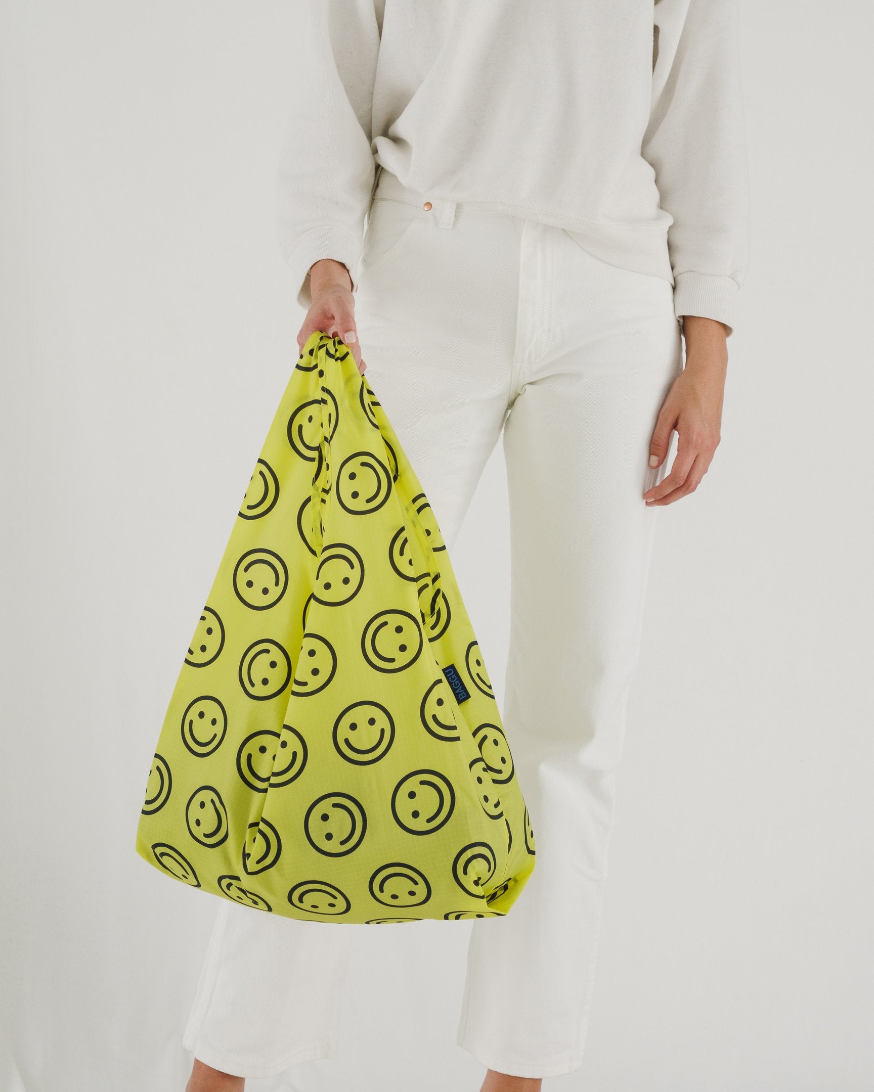 Baggu Standard Reusable Shopping Bag - Eco-Friendly Foldable Tote for Groceries & Beach (Yellow Happy) | Perfect for Grocery Shopping, Travel & Daily Errands