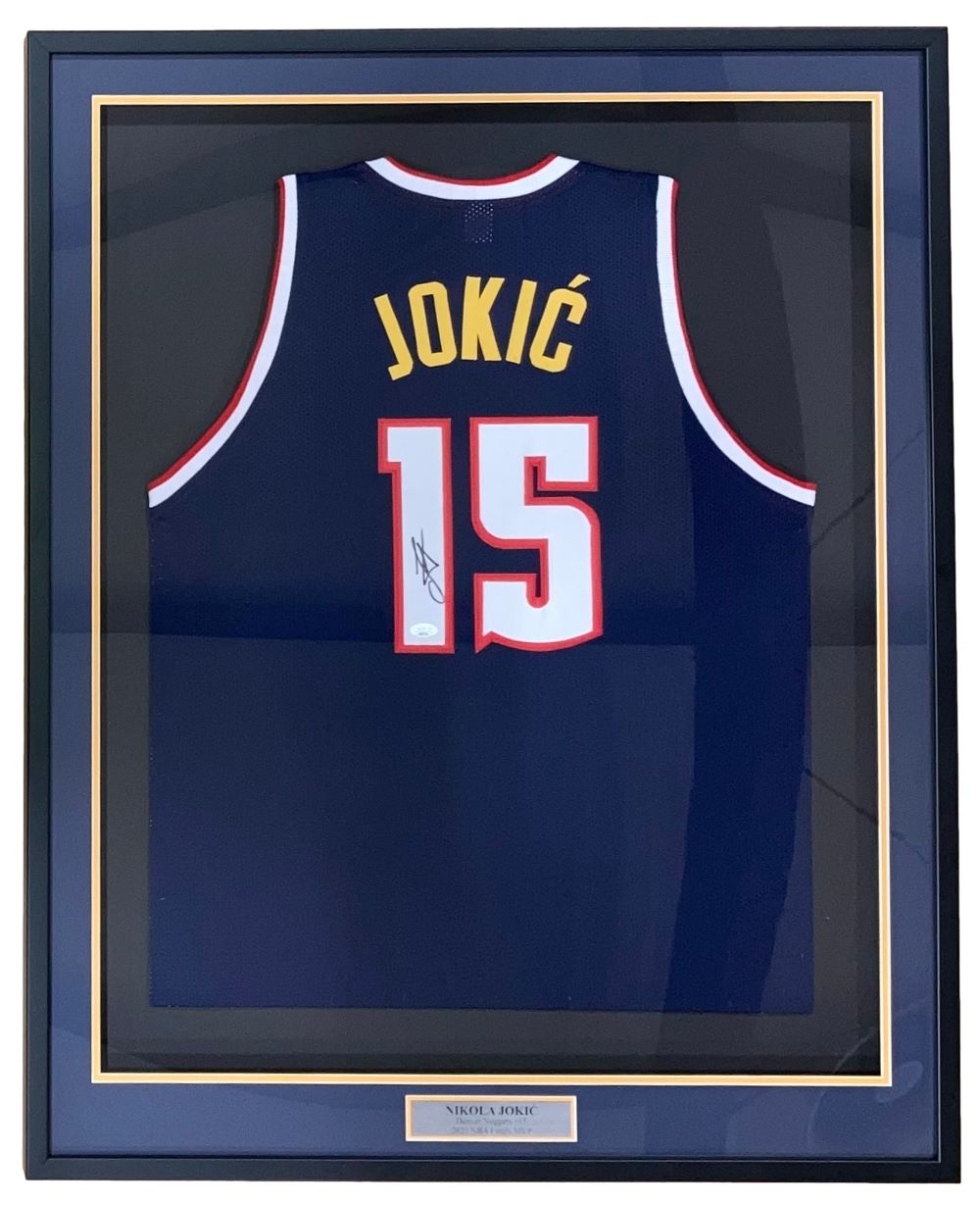 Authentic Nikola Jokic Denver Nuggets Signed Framed Navy Blue Basketball Jersey with JSA COA - Perfect for Sports Memorabilia Collectors and Denver Nuggets Fans Display