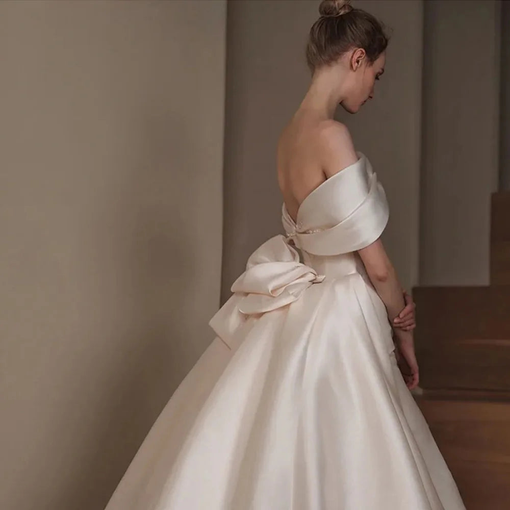 Elegant Off Shoulder Sweetheart Neck Beaded Bow Satin 2-Piece Mermaid Wedding Dress with Detachable Train - Perfect for Beach, Church, and Formal Wedding Ceremonies