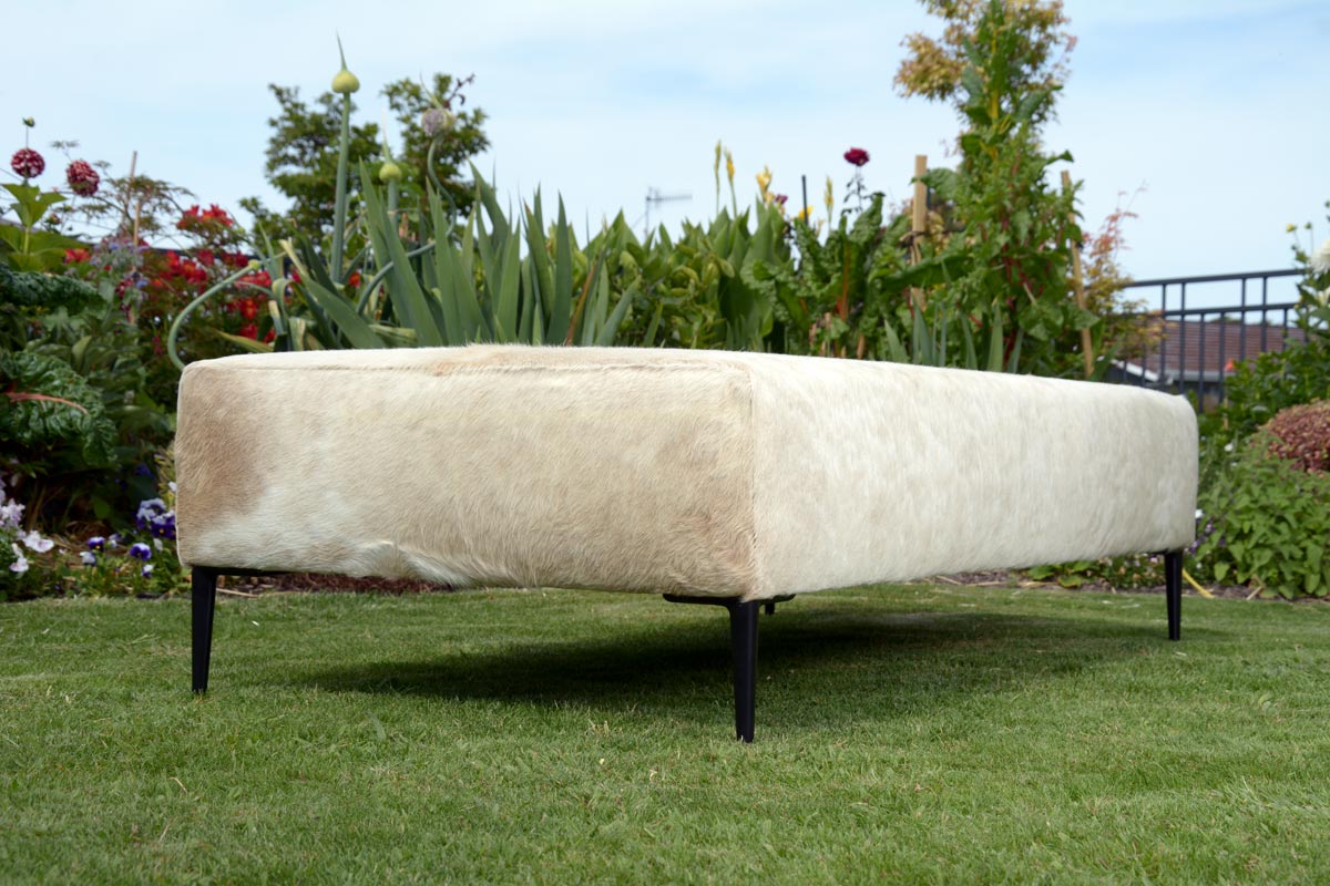 Premium Beige Cowhide Ottoman with Black Legs - 60
