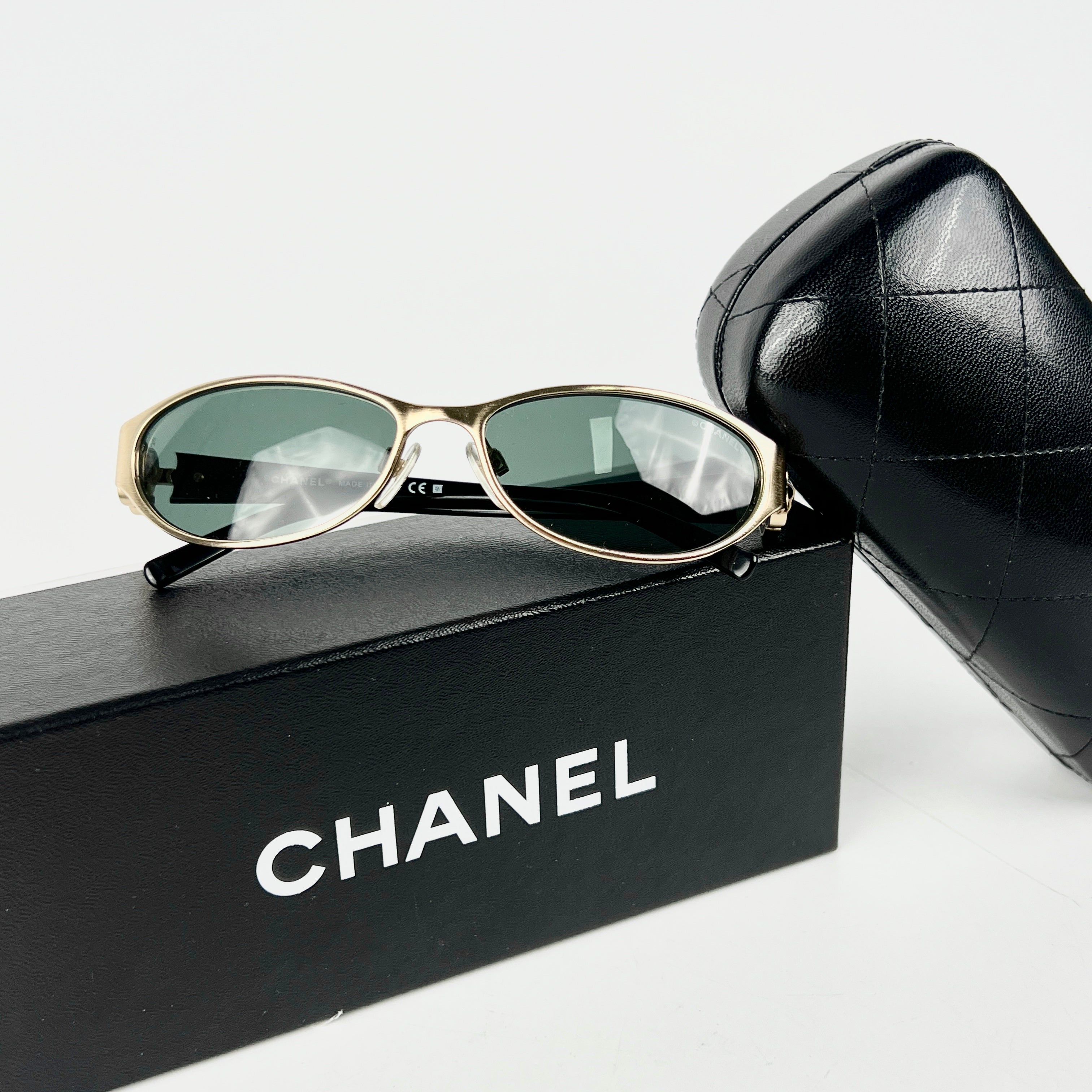 Chanel Gold and Black Sunglasses for Women - Luxury Designer Shades for Fashion, Beach & Outdoor Activities