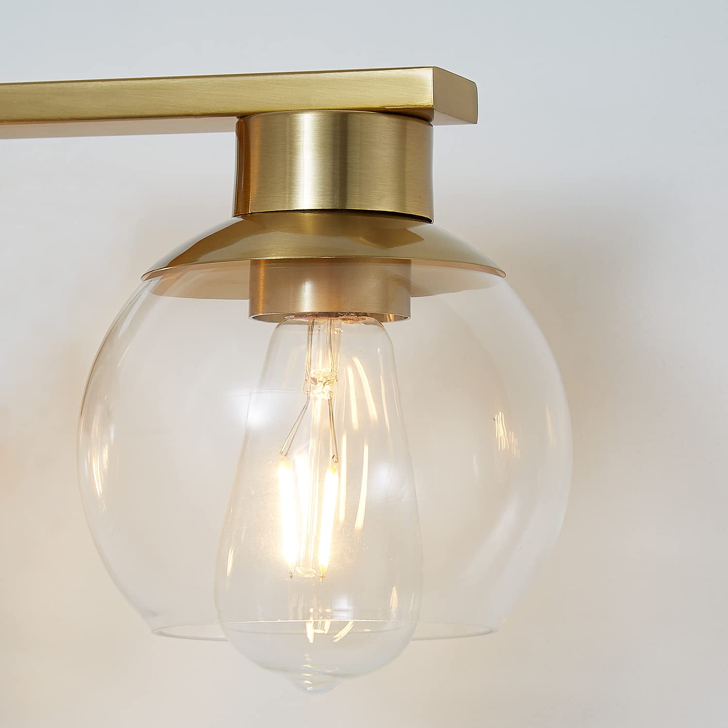 PAZALA Brushed Brass Bathroom Light Fixture - 4-Light Vanity Wall Sconce with Globe Glass Shade, E26 Base - Modern Over Mirror Lighting for Bathroom, Bedroom & Hallway - Dimmable Vanity Lights for Makeup, Shaving & Ambient Lighting