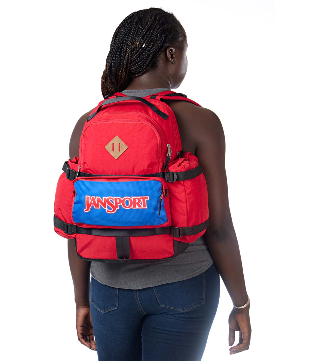 JanSport Seattle Pack Backpack - Durable Laptop Backpack for School, Travel & Work - Red Tape Design - Perfect for College Students & Professionals