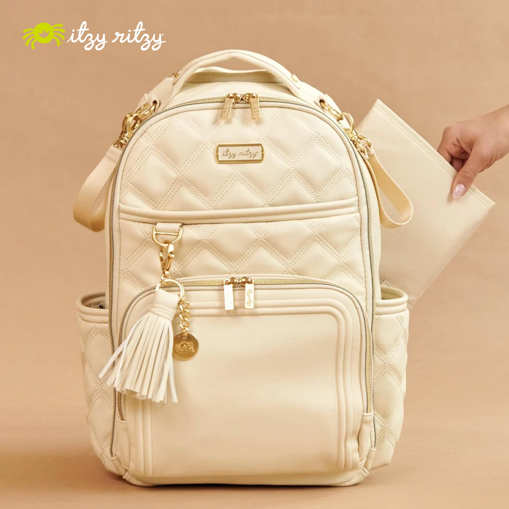 Itzy Ritzy Diaper Bag Backpack - Large Capacity Baby Backpack with 19 Pockets, Changing Pad & Stroller Clips | Comfortable Straps for Moms | Perfect for Travel, Daycare & On-the-Go Parenting (Milk & Honey)