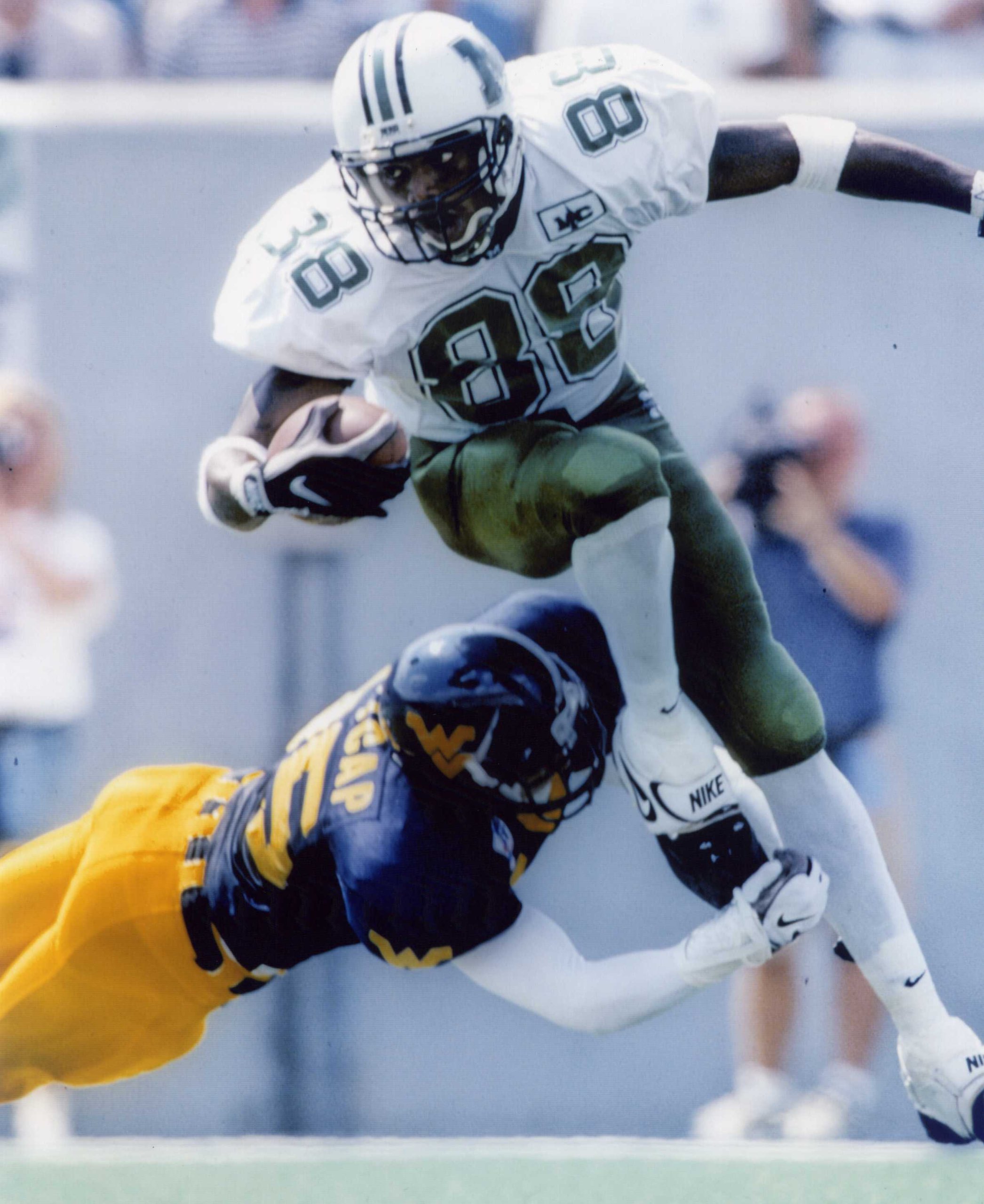 Randy Moss College 8x10 High Glossy Sports Action Photo - Premium Football Memorabilia for Fans, Collectors, and Sports Enthusiasts - Perfect for Home Decor, Man Cave, or Gift Giving