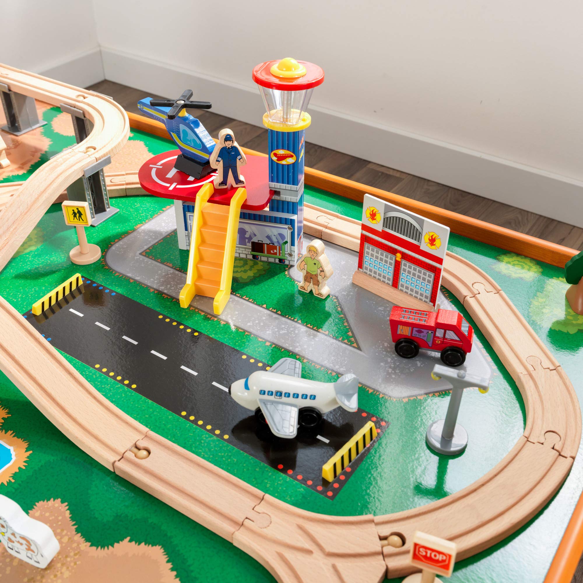 KidKraft Ride Around Town Wooden Train Set with Table - 100-Piece Playset Includes Helicopter, Airplane & Farm Accessories - Storage Bins & Major Brand Compatibility - Perfect for Preschool Playrooms & Toddler Birthday Gifts (Honey Finish)