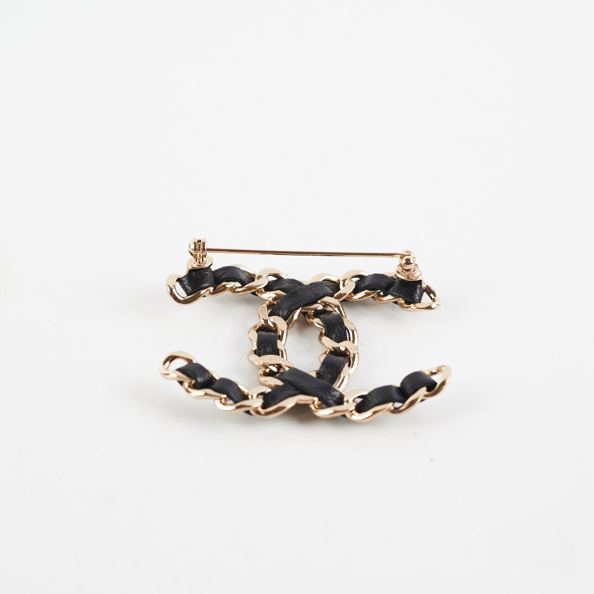 Chanel CC Leather Brooch - Black Fashion Jewelry for Women | Elegant Accessory for Dresses, Jackets & Bags