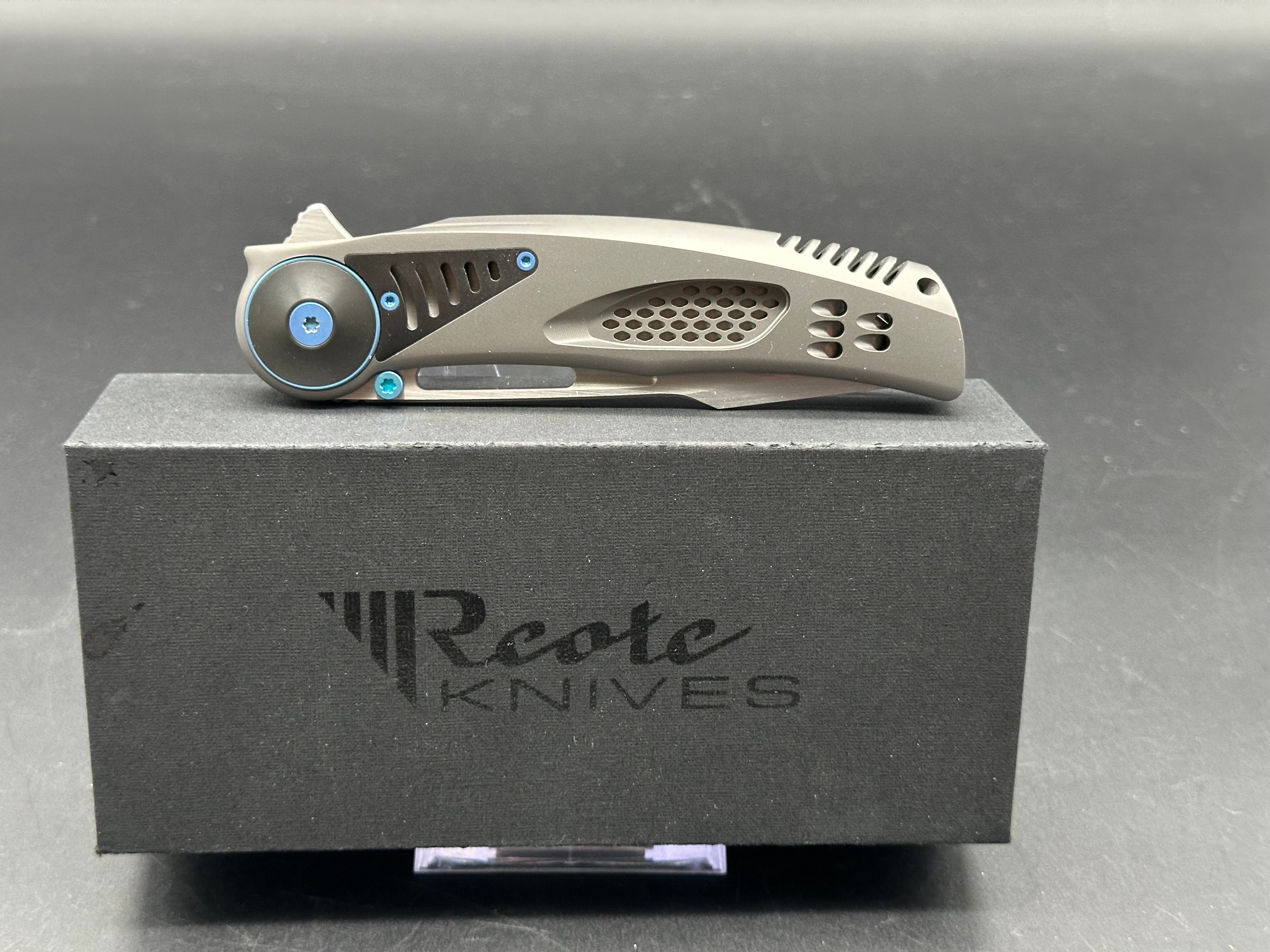 REATE GTR Titanium Folding Knife with Zirconium Inlay & Blue Hardware - M390 Steel Blade - EDC Pocket Knife for Outdoor Camping, Hiking and Everyday Carry