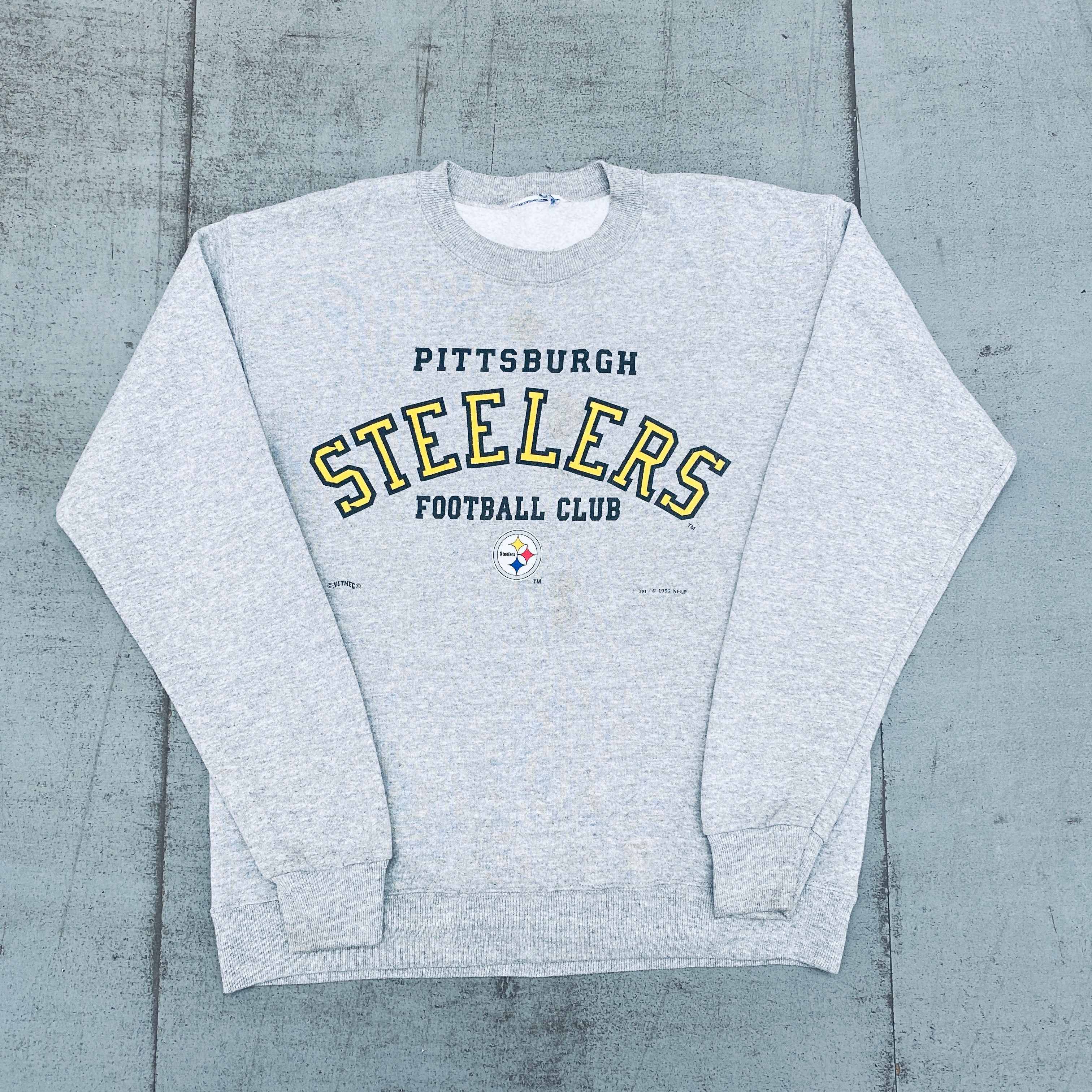 Pittsburgh Steelers 1995 Nutmeg Mills Graphic Spellout Sweatshirt - Men's Vintage NFL Football Fan Apparel for Game Day & Casual Wear