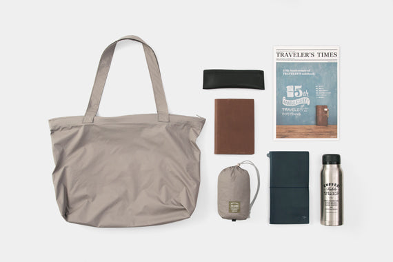 TRAVELER'S COMPANY Traveler's Factory x TO&FRO Waterproof Rain Bag in Warm Gray - Perfect for Outdoor Adventures, Commuting & Travel