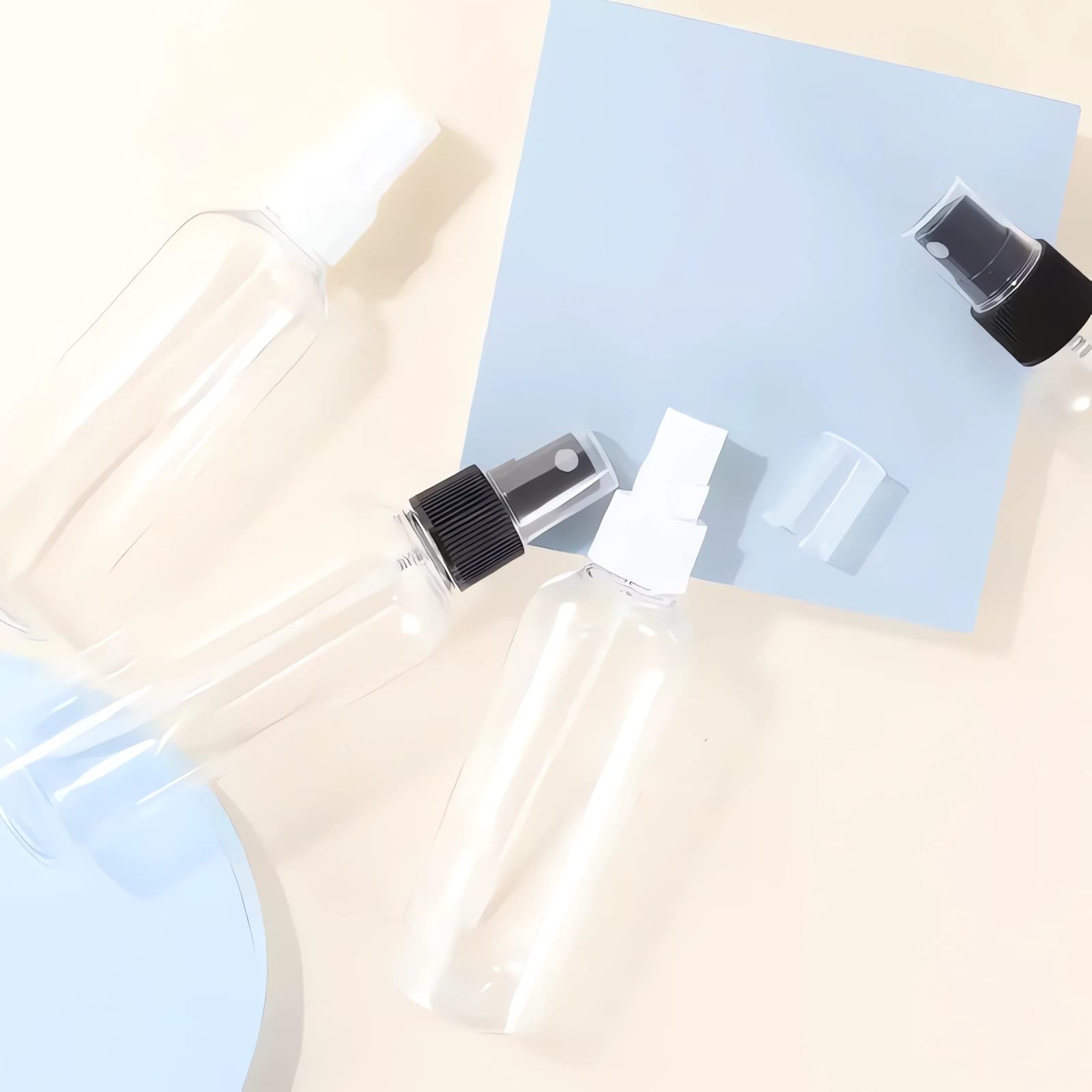 LusDoly 100 Pack - 100ml Empty Plastic Fine Mist Spray Bottles with White Sprayer & Funnel - Refillable Travel Containers for Perfume, Cosmetic, Hair Care, Essential Oils - Perfect for DIY, Salon, Home & Travel Use