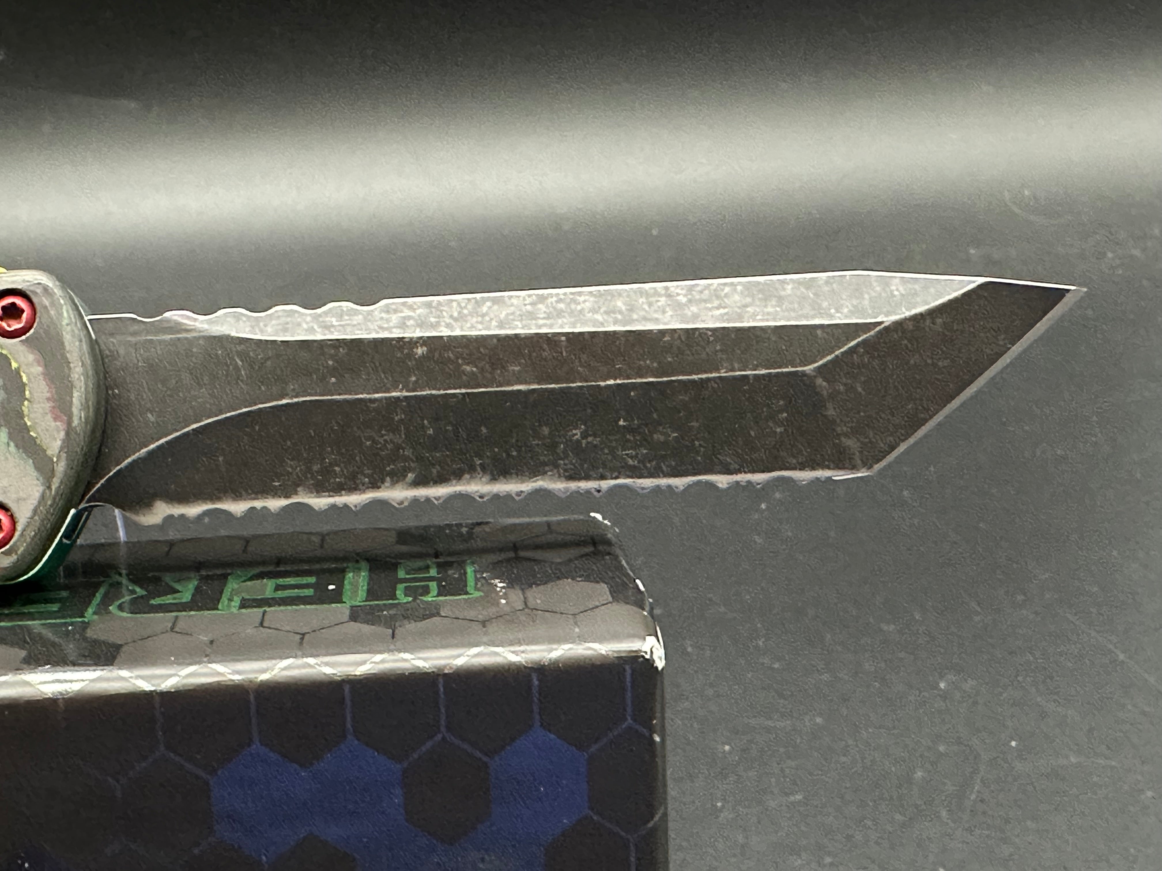 Heretic Manticore X Bounty Hunter Camo Carbon Handle OTF Knife - Black MagnaCut Serrated Tanto Blade for Tactical, Outdoor & EDC Use