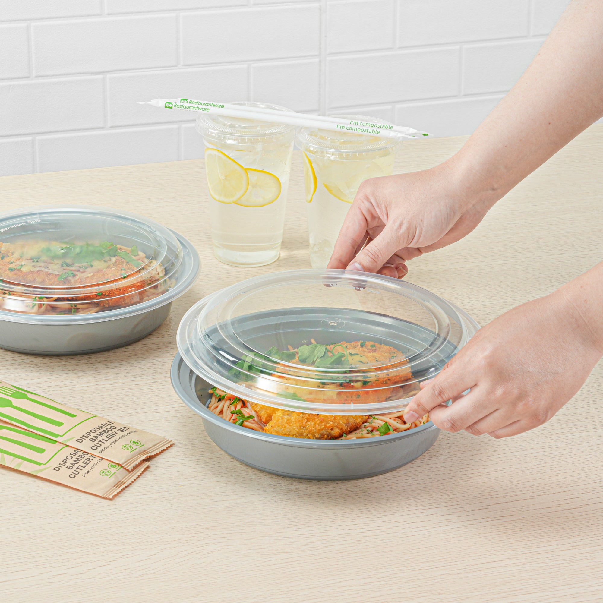 48oz Round Silver Plastic Takeout Containers with Clear Lids - 100 Pack (9