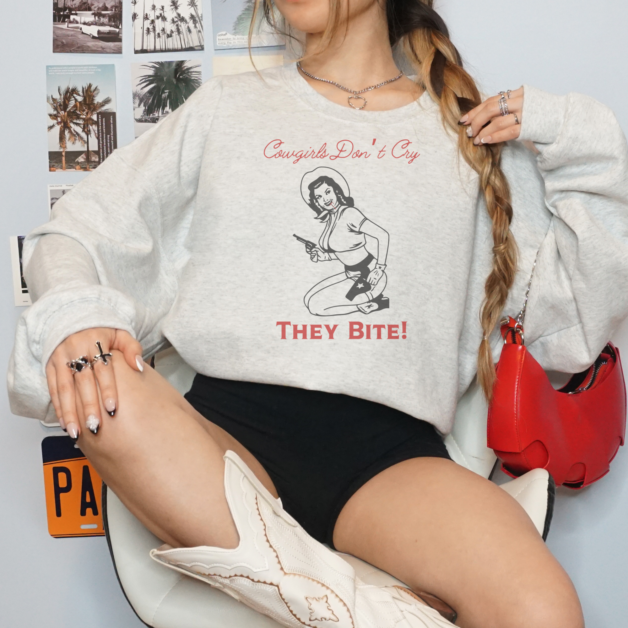 Stylish Cowgirls Bite Graphic Crewneck Sweatshirt - Western Fashion for Women | Perfect for Rodeo, Country Concerts & Casual Outfits