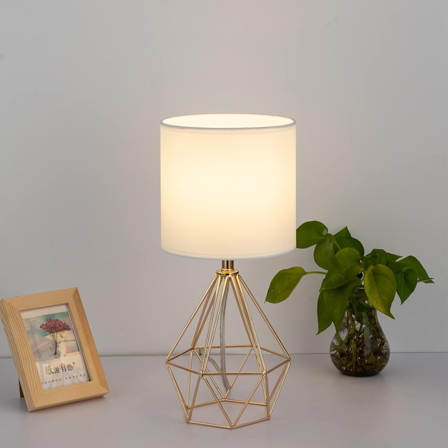 Modern Gold Hollow Out Base Bedside Table Lamp with Geometric Metal Base & White Fabric Shade - Elegant Nightstand Lamp for Bedroom, Kids Room & Living Room - Perfect for Reading, Decor & Ambient Lighting