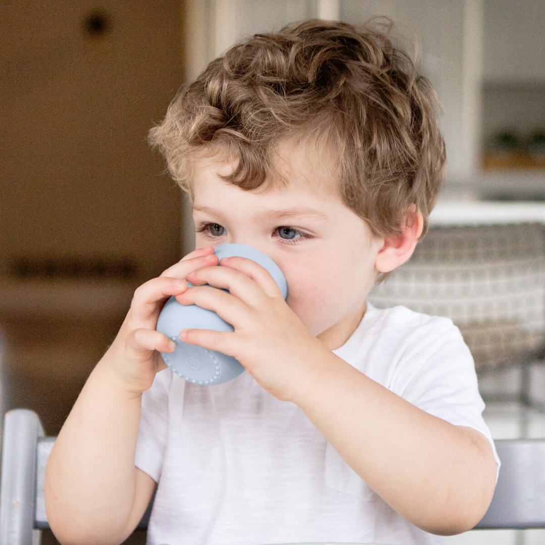 ezpz Mini Cup - Non-Spill Silicone Toddler Cup with Lid | Perfect for Baby's First Sippy Cup, Travel & Daycare Use