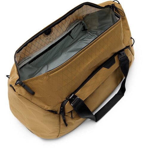 Peak Design Travel Duffel 35L Carry-On Duffel Bag - Waterproof & Durable Coyote Brown Backpack for Adventure Travel, Camping & Outdoor Activities